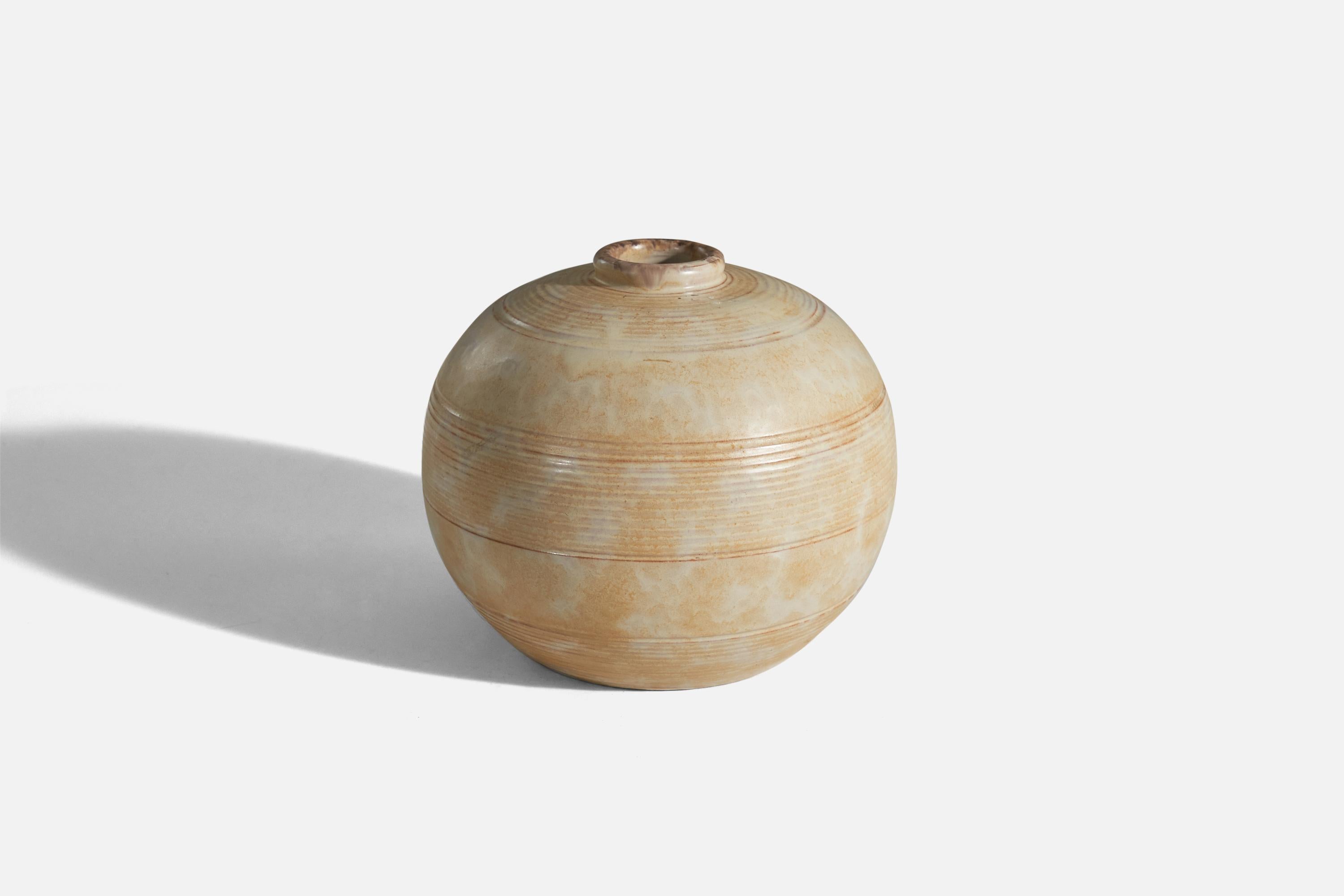 A beige, glazed earthenware vase designed and produced by Upsala-Ekeby, Sweden, 1940s.

  