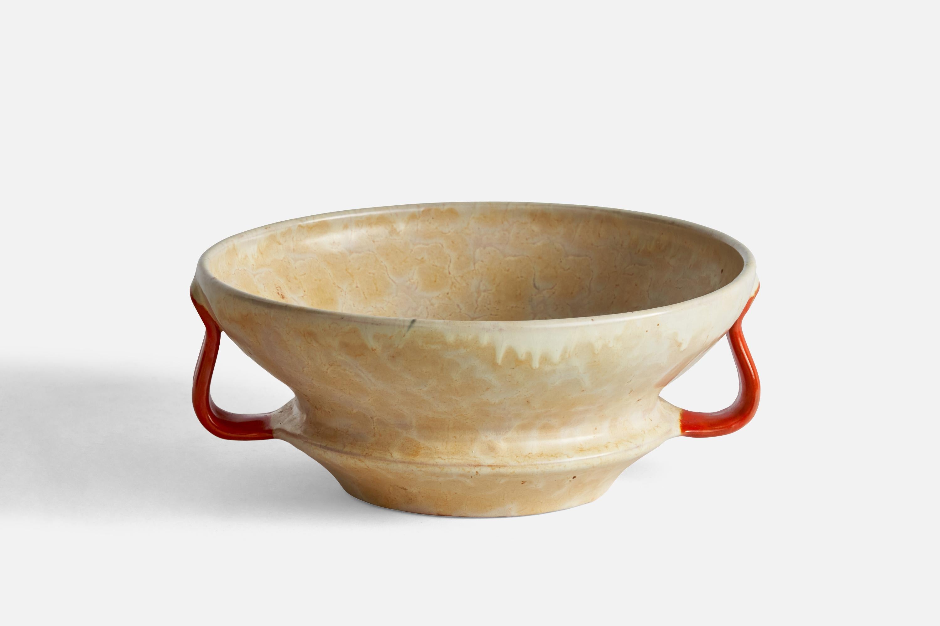 A beige and orange-glazed earthenware bowl designed and produced by Upsala Ekeby, Sweden, 1930s.