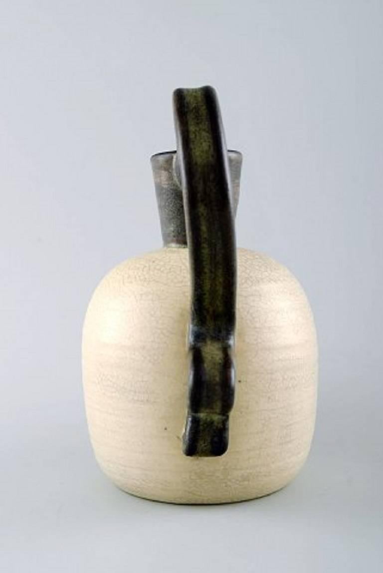 Upsala-Ekeby ceramic vase with handles.
Sweden, mid-20th century.
In perfect condition.
Measures 14 cm. x 14 cm.
Stamped.