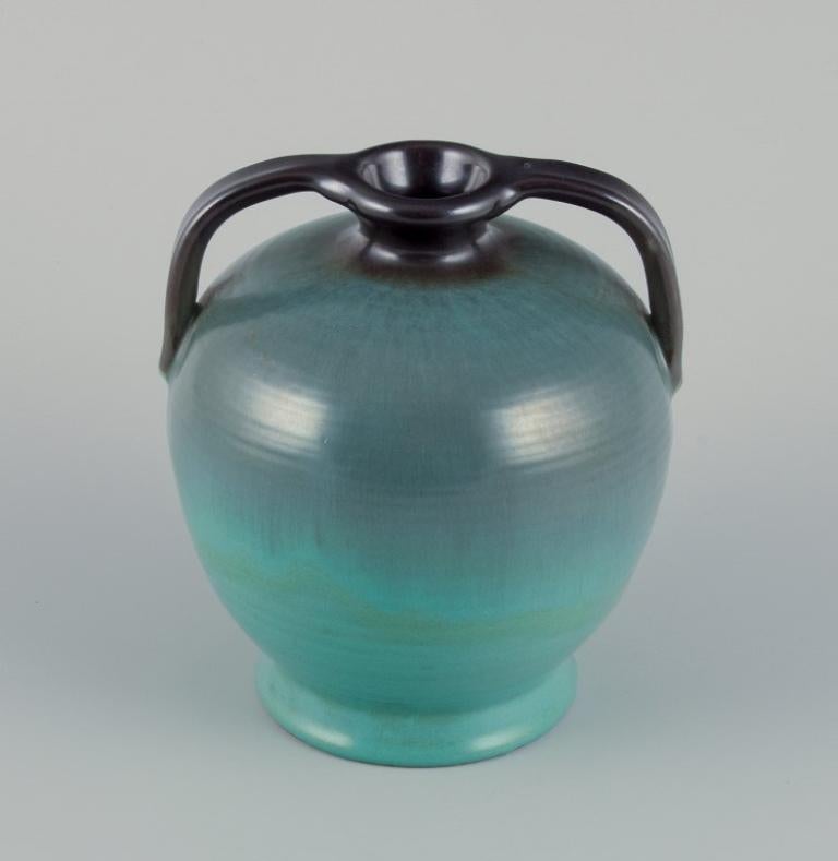 Glazed Upsala Ekeby ceramic vase with two handles. Glaze in greenish tones. For Sale