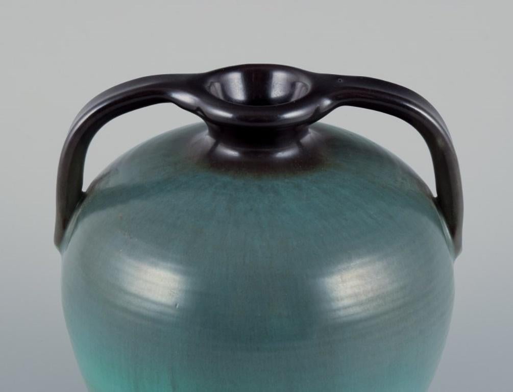 Upsala Ekeby ceramic vase with two handles. Glaze in greenish tones. In Excellent Condition For Sale In Copenhagen, DK