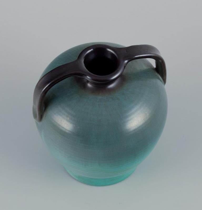 Upsala Ekeby ceramic vase with two handles. Glaze in greenish tones. For Sale 1