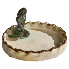 Piatti decorativi e videopoche in ceramica