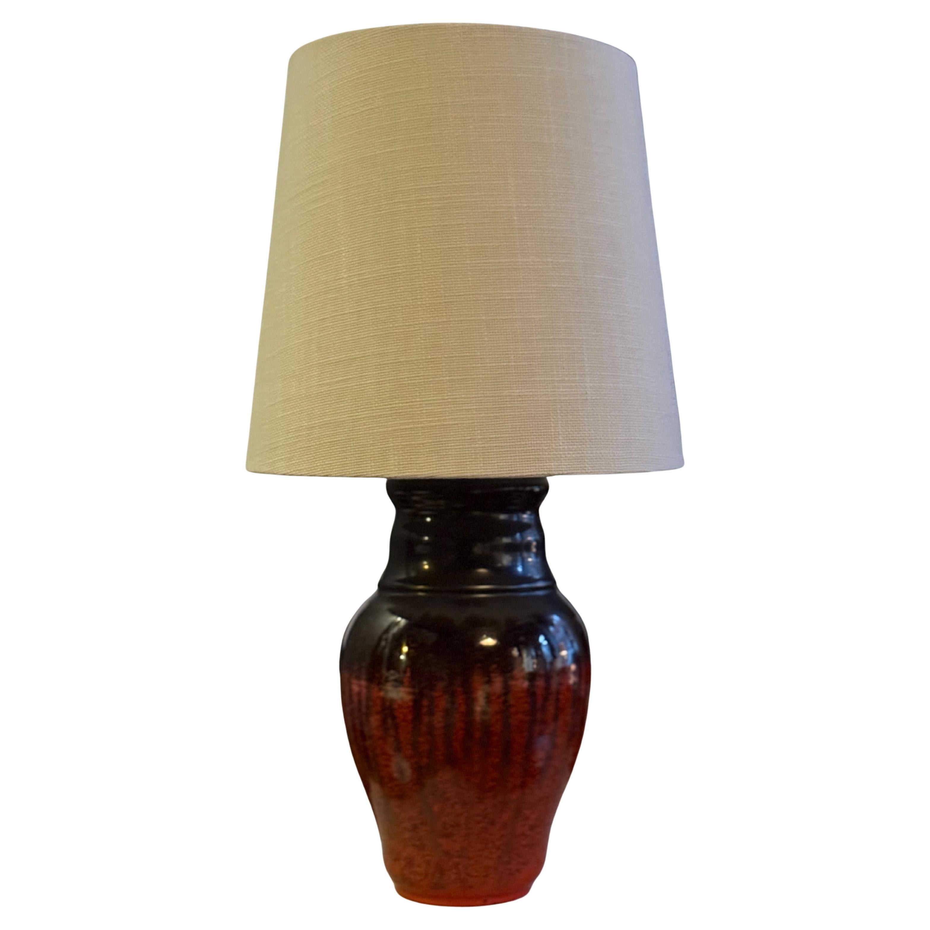 Upsala-Ekeby Earthenware Art Table Lamp OTTO in black and orange. 1930s. For Sale