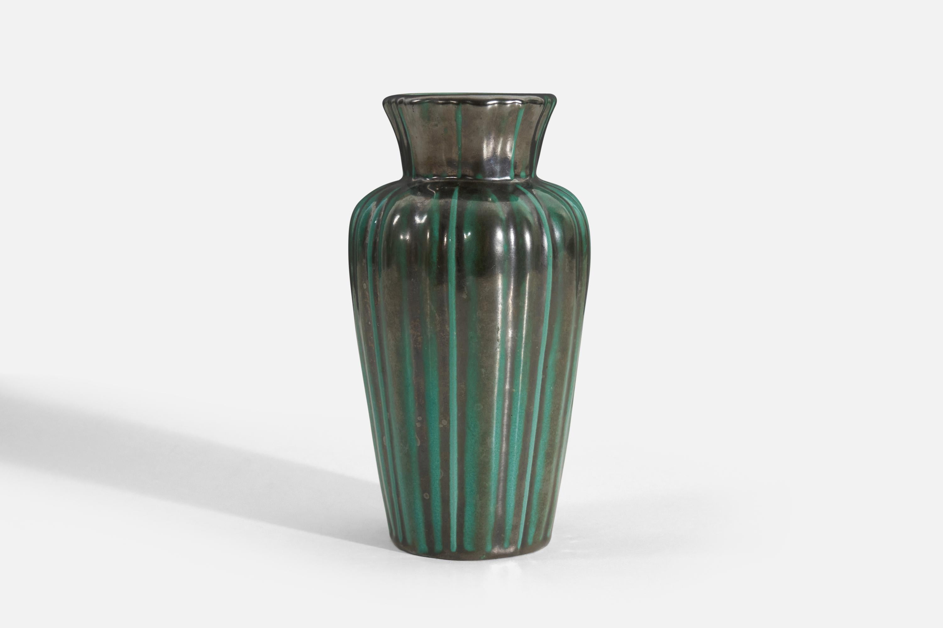 A green-glazed earthenware vase produced by Upsala-Ekeby, Sweden, 1940s.

