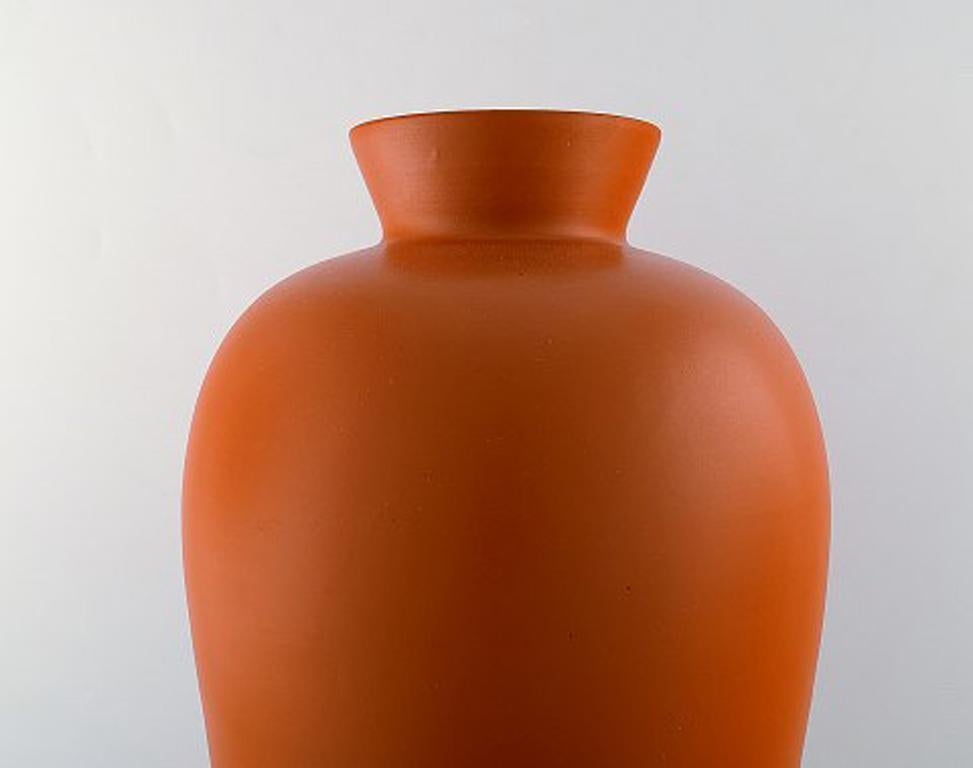 Upsala-Ekeby. Large ceramic vase, orange glaze. Stylish design. 1960s-1970s.
Stamped.
In very good condition.
Measures: 44 x 24 cm.