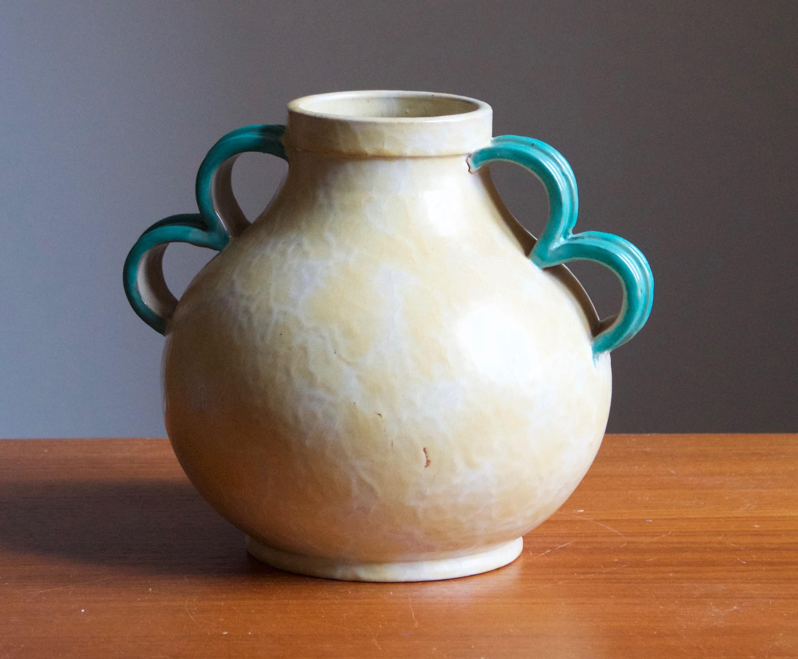 A large early modernist vase. Produced by Upsala-Ekeby, Sweden, 1930s.

Other designers of the period include Ettore Sottsass, Carl Harry Stålhane, Lisa Larsson, Axel Salto, and Arne Bang.