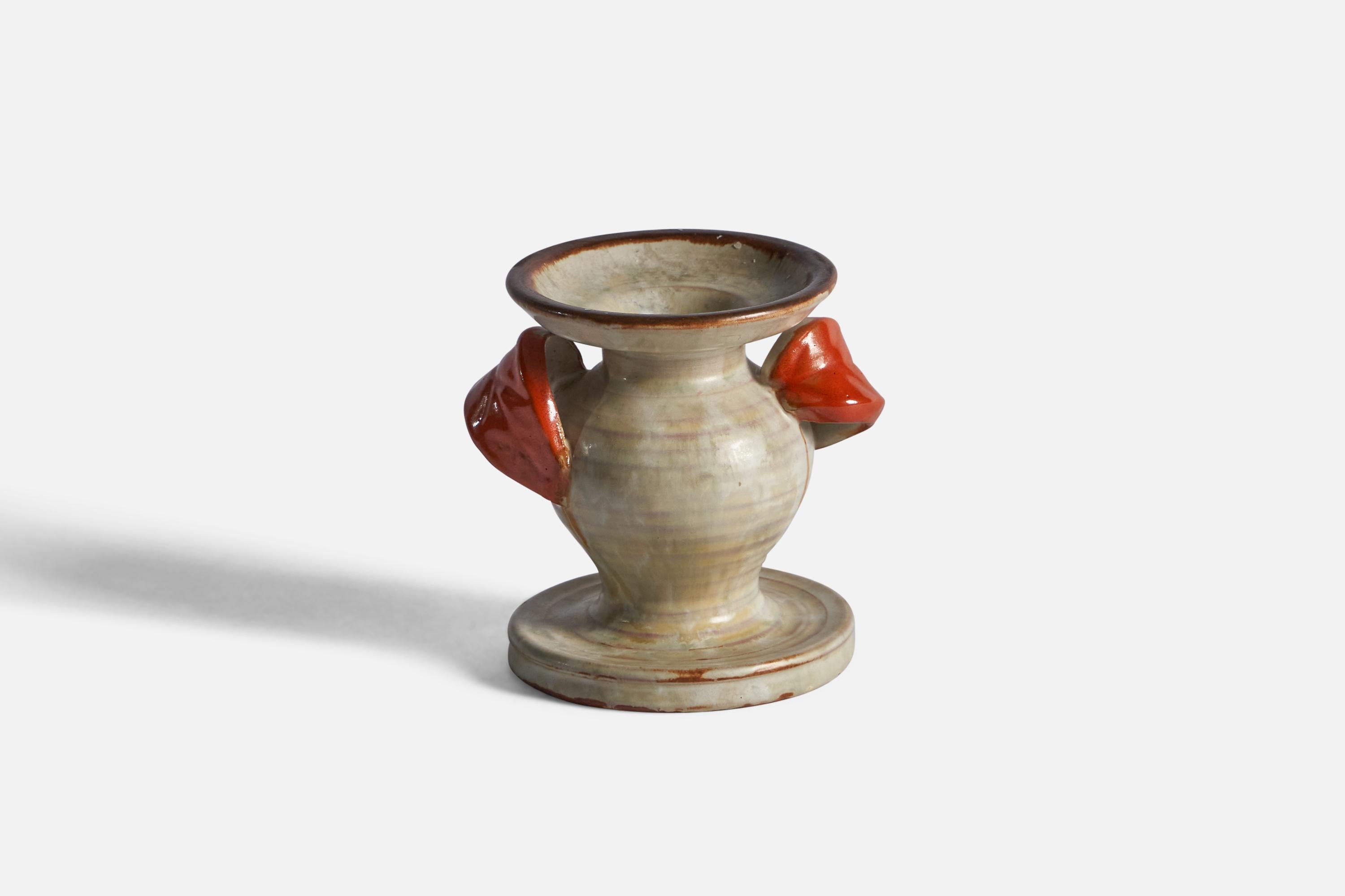 A small orange and beige-glazed earthenware vase, designed and produced by Upsala Ekeby, Sweden, c. 1930s.