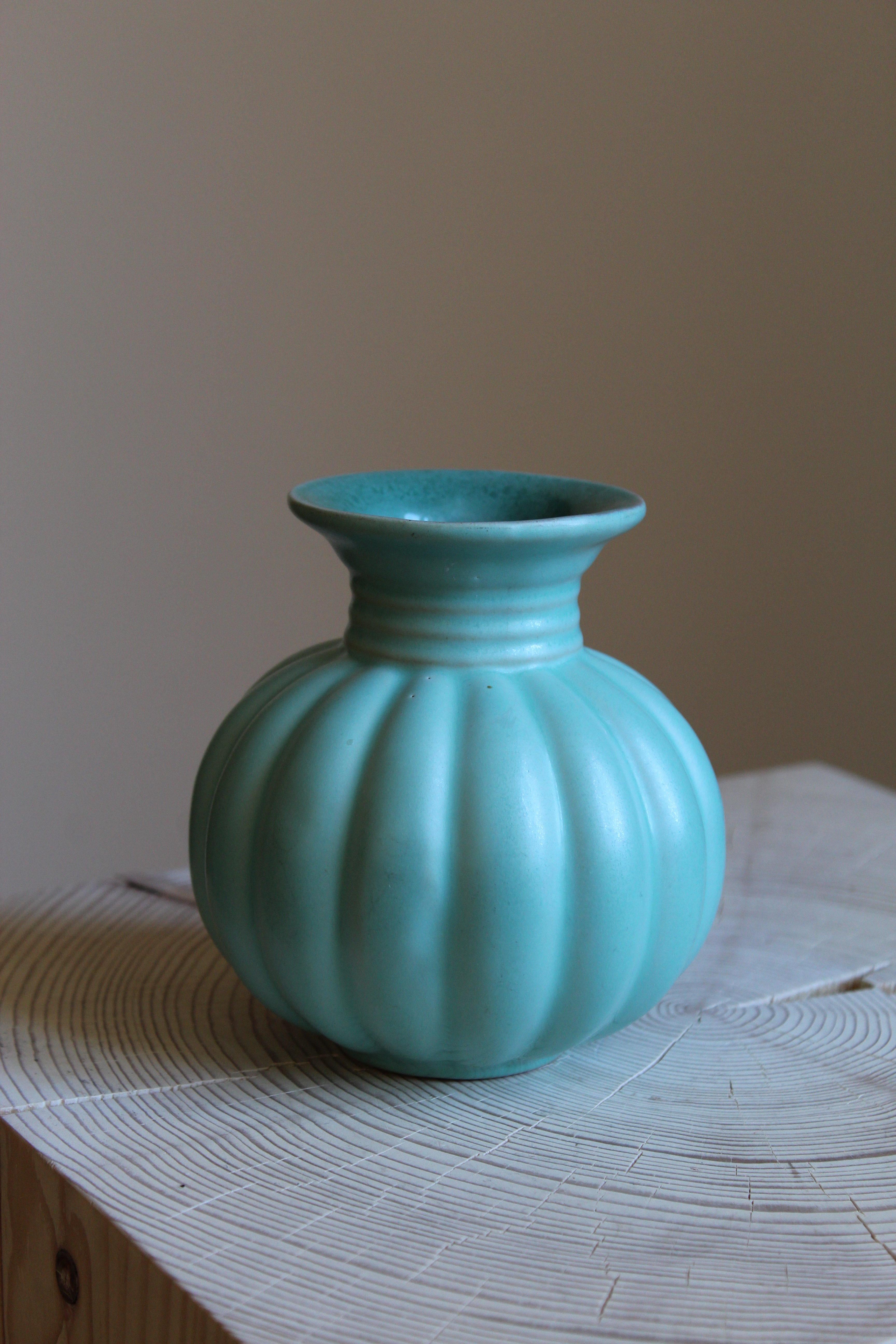 A small early modernist vase. Produced by Upsala-Ekeby, Sweden, 1940s. 

Other designers of the period include Ettore Sottsass, Carl Harry Stålhane, Lisa Larsson, Axel Salto, and Arne Bang.