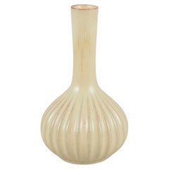 Upsala Ekeby, Sweden. Ceramic vase with a round shape and narrow neck.