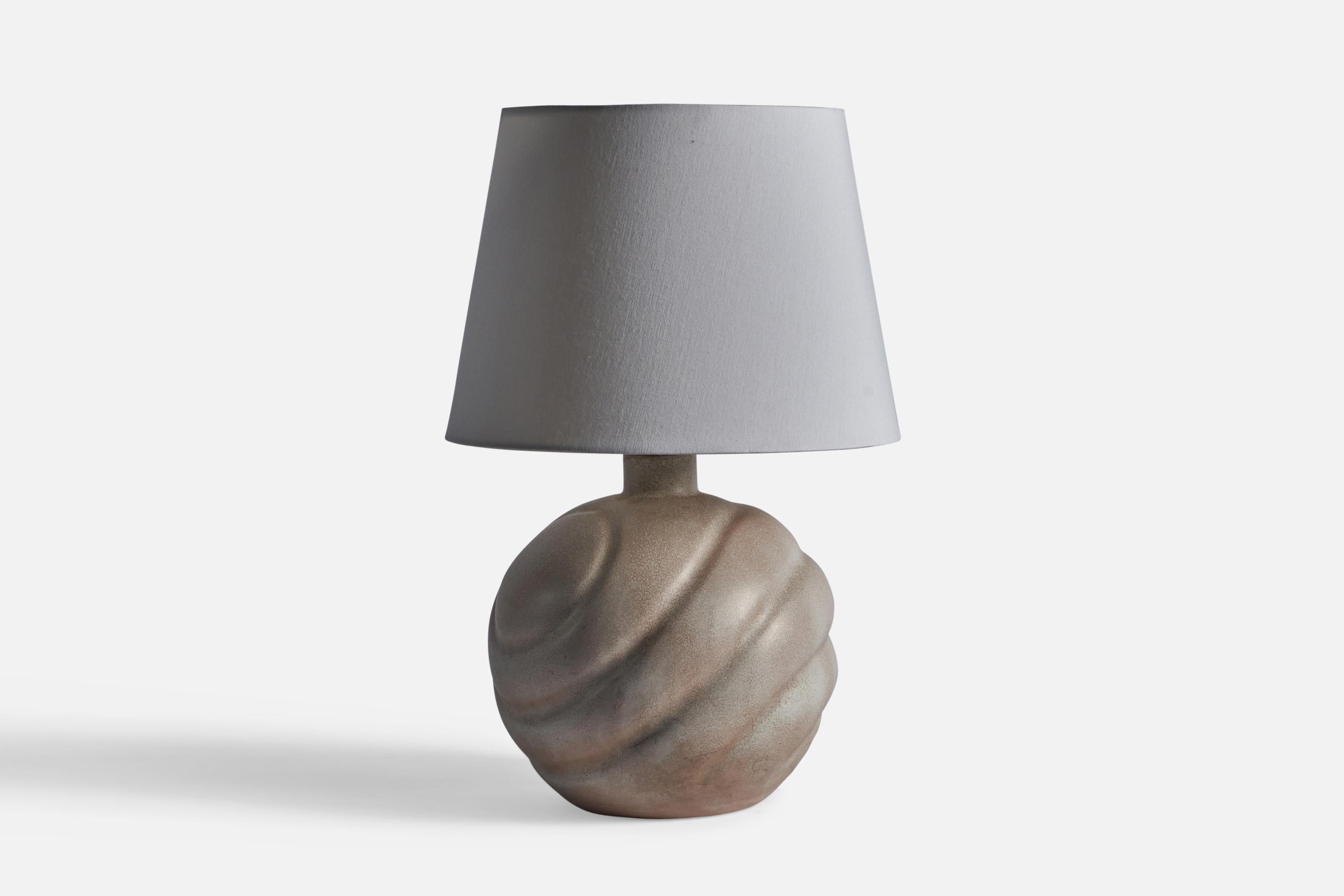 A grey-glazed earthenware and brass table lamp, designed and produced by Upsala Ekeby, Sweden, 1930s.

Dimensions of Lamp (inches): 18.75