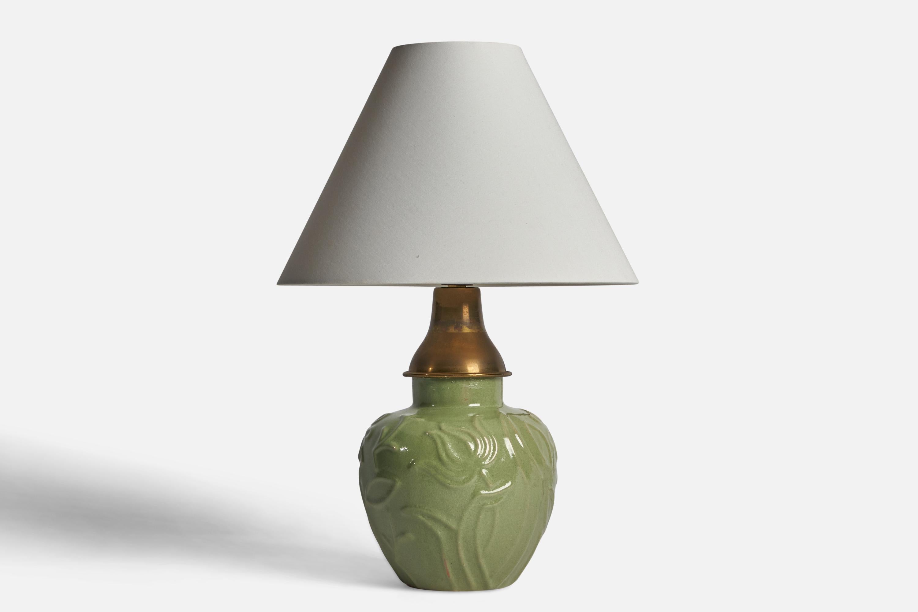 A green-glazed earthenware and brass table lamp designed and produced by Upsala Ekeby, Sweden, 1930s.

Dimensions of Lamp (inches): 11” H x 6” Diameter
Dimensions of Shade (inches): 3.5” Top Diameter x 10” Bottom Diameter x 7.25”
Dimensions of Lamp