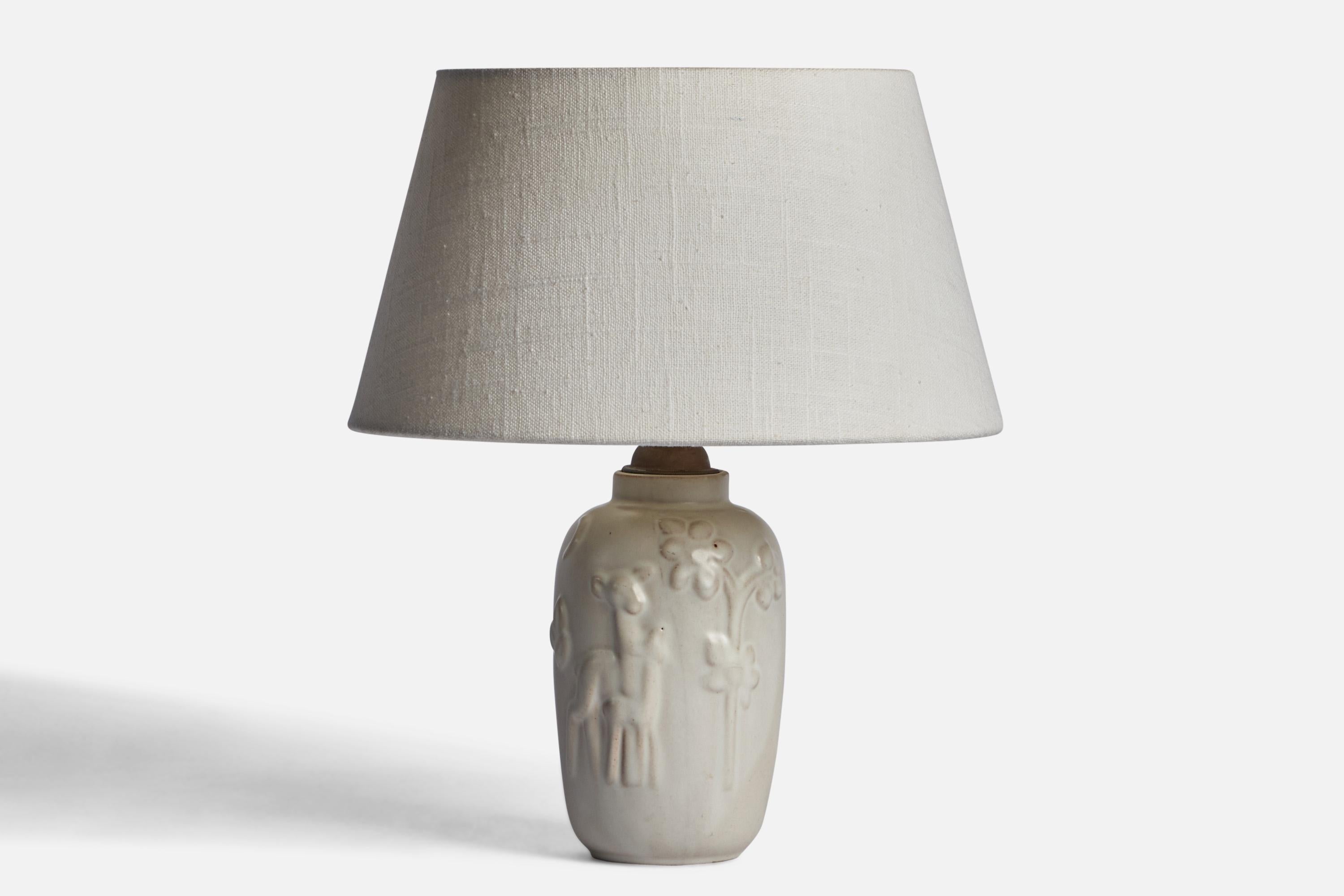 A light grey-glazed earthenware table lamp designed and produced in Sweden, 1930s.

Dimensions of Lamp (inches): 9” H x 3.75” Diameter
Dimensions of Shade (inches): 7” Top Diameter x 10” Bottom Diameter x 5.5” H 
Dimensions of Lamp with Shade