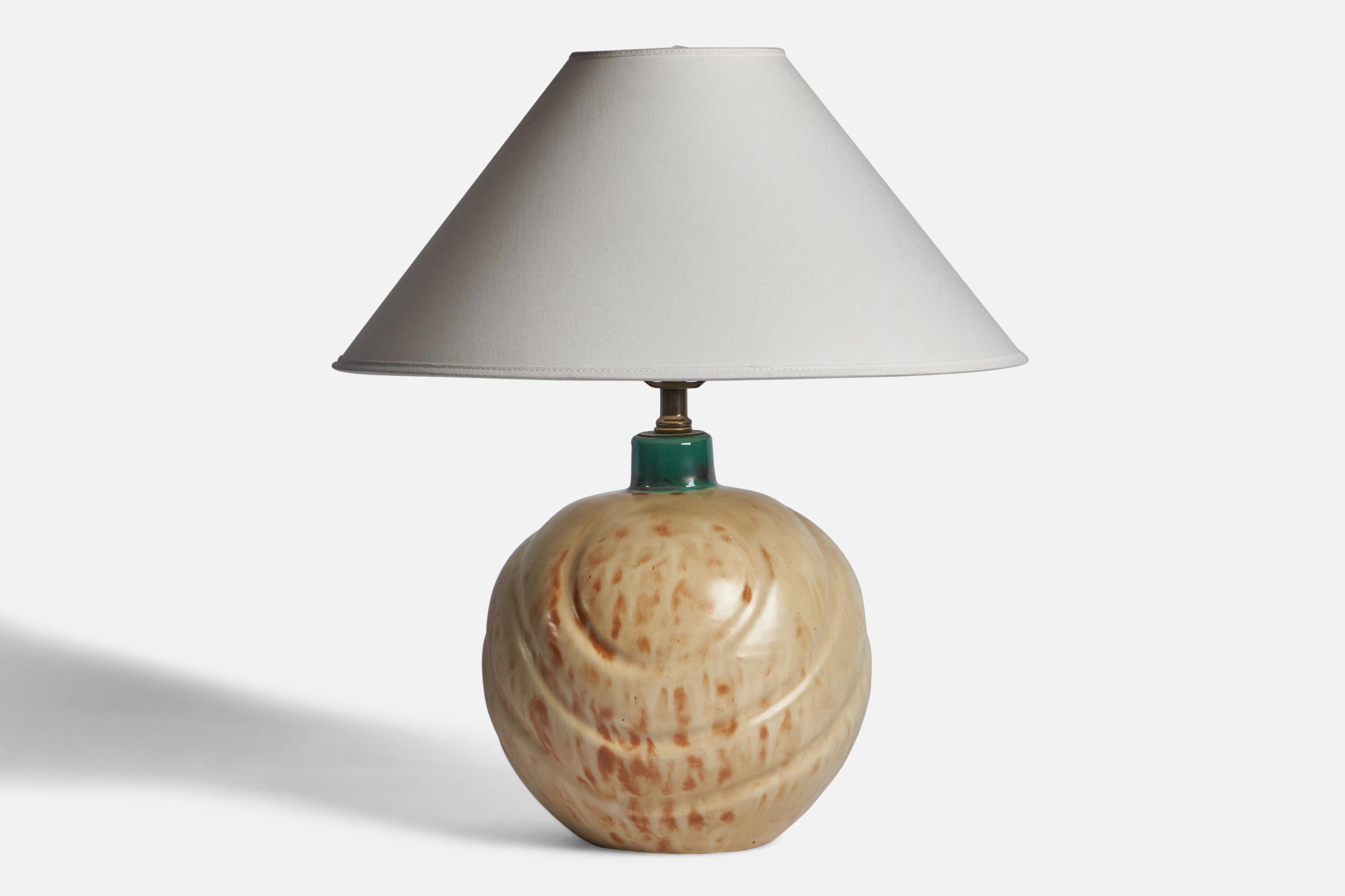 A green and beige-glazed earthenware table lamp designed and produced by Upsala Ekeby, Sweden, 1930s.

Dimensions of Lamp (inches): 13.25” H x 8.8” Diameter
Dimensions of Shade (inches): 4.5” Top Diameter x 16” Bottom Diameter x 7.15” H 
Dimensions