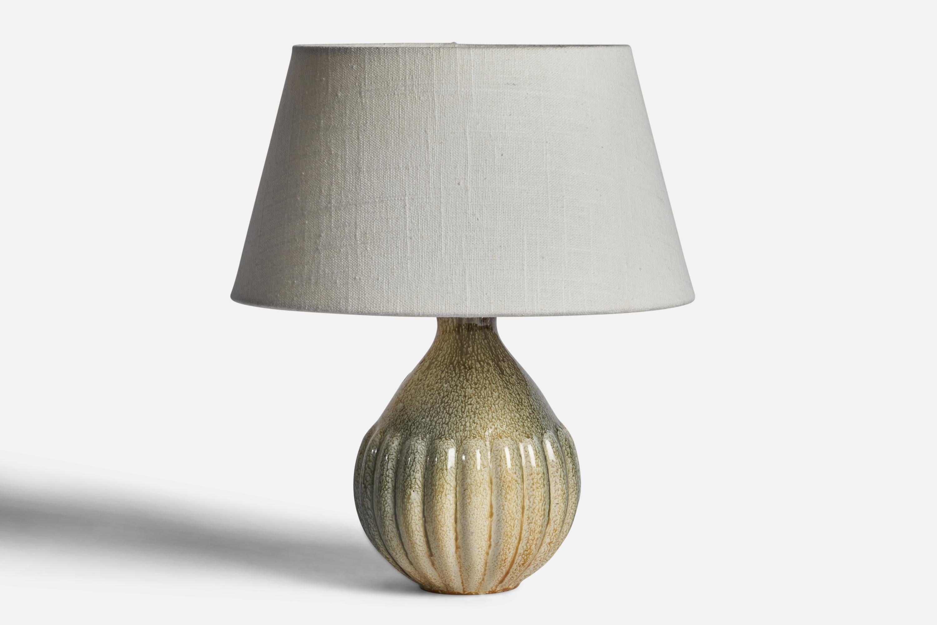 A beige grey-glazed earthenware table lamp designed and produced by Upsala Ekeby, Sweden, 1940s.

Dimensions of Lamp (inches): 8.75” H x 4.75” Diameter
Dimensions of Shade (inches): 7” Top Diameter x 10” Bottom Diameter x 5.5” H 
Dimensions of Lamp