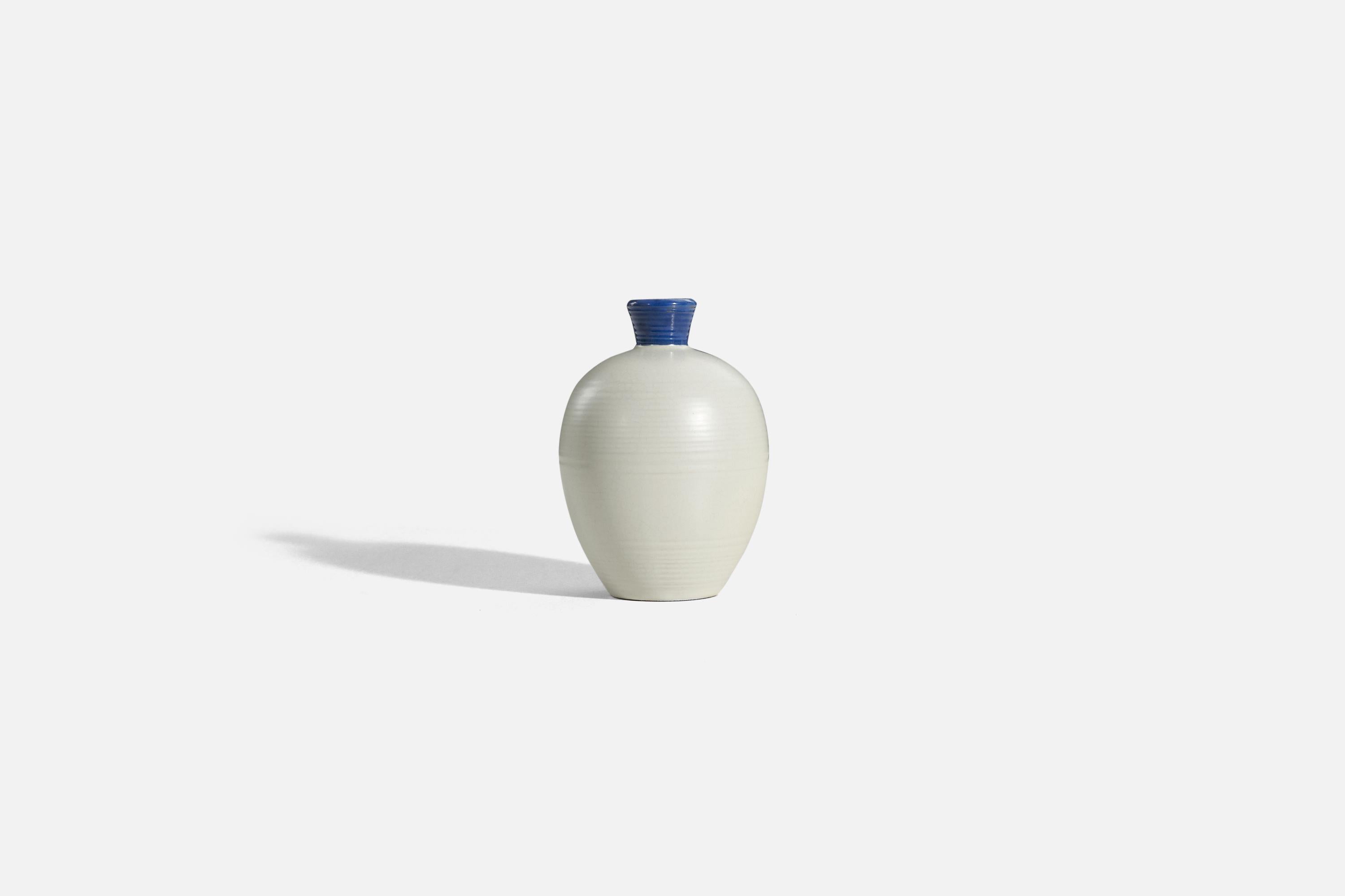 A blue and white, glazed earthenware vase designed and produced by Upsala-Ekeby, Sweden, c. 1940s.


