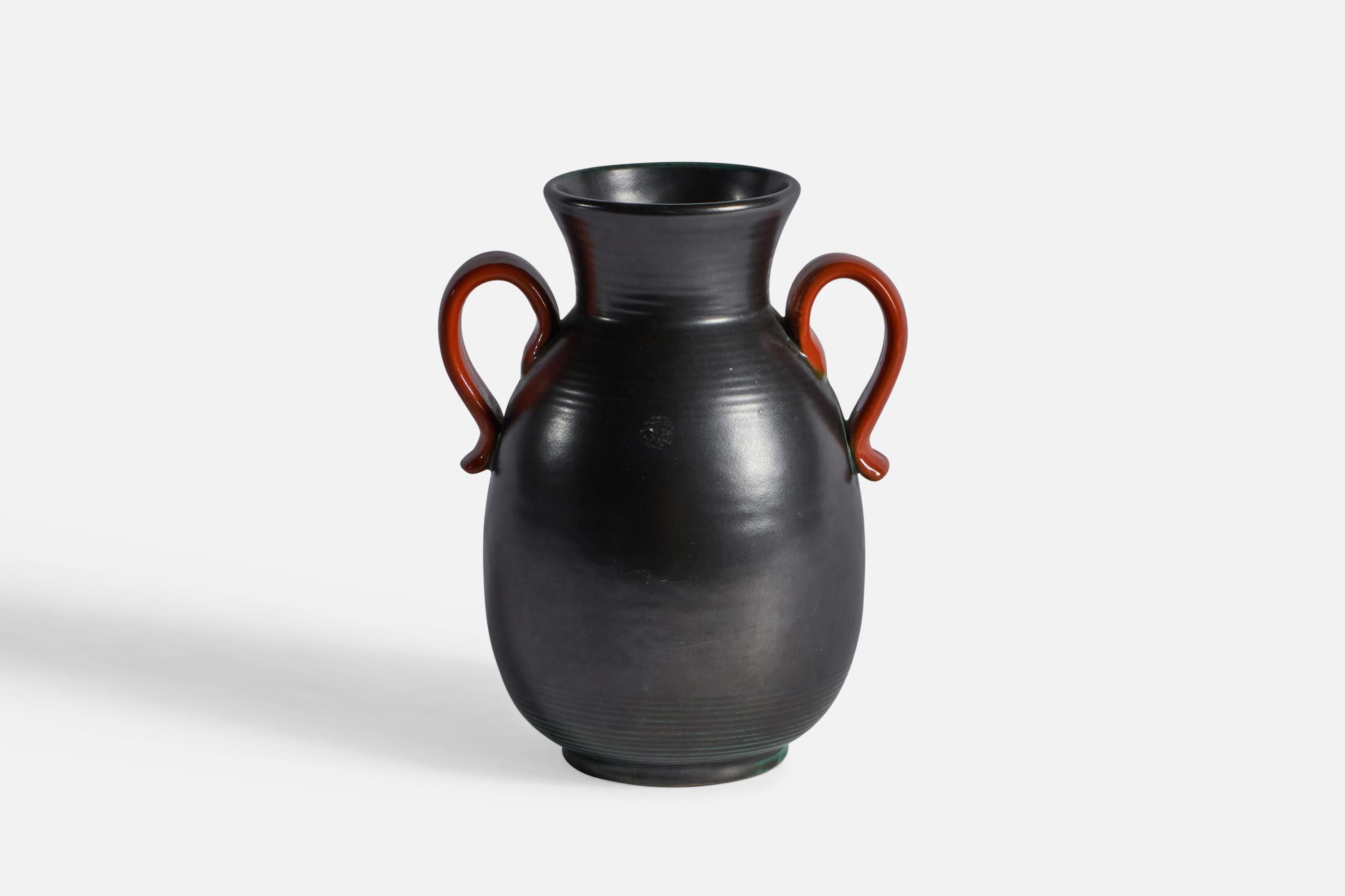 A green, black and orange-glazed earthenware vase, designed and produced by Upsala Ekeby, Sweden, c. 1930s.
