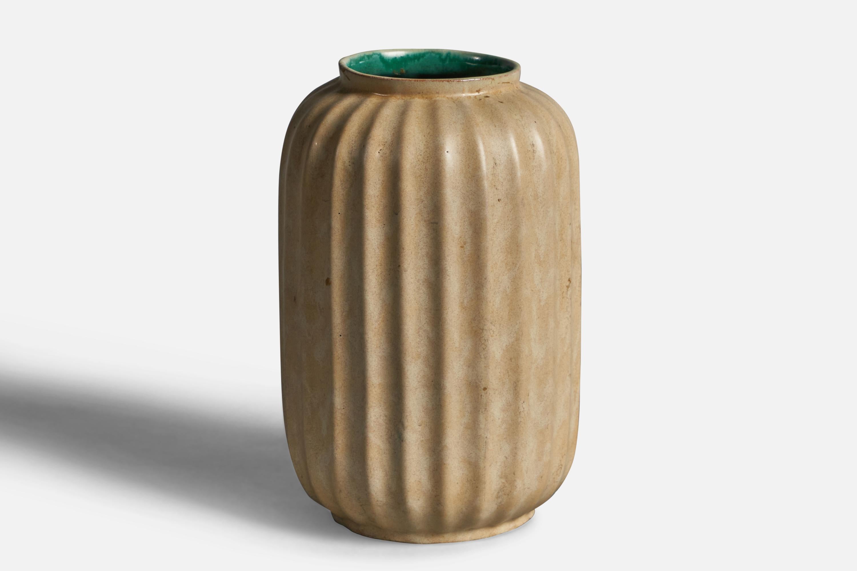 A fluted beige and green-glazed vase designed and produced by Upsala Ekeby, Sweden, 1930s.