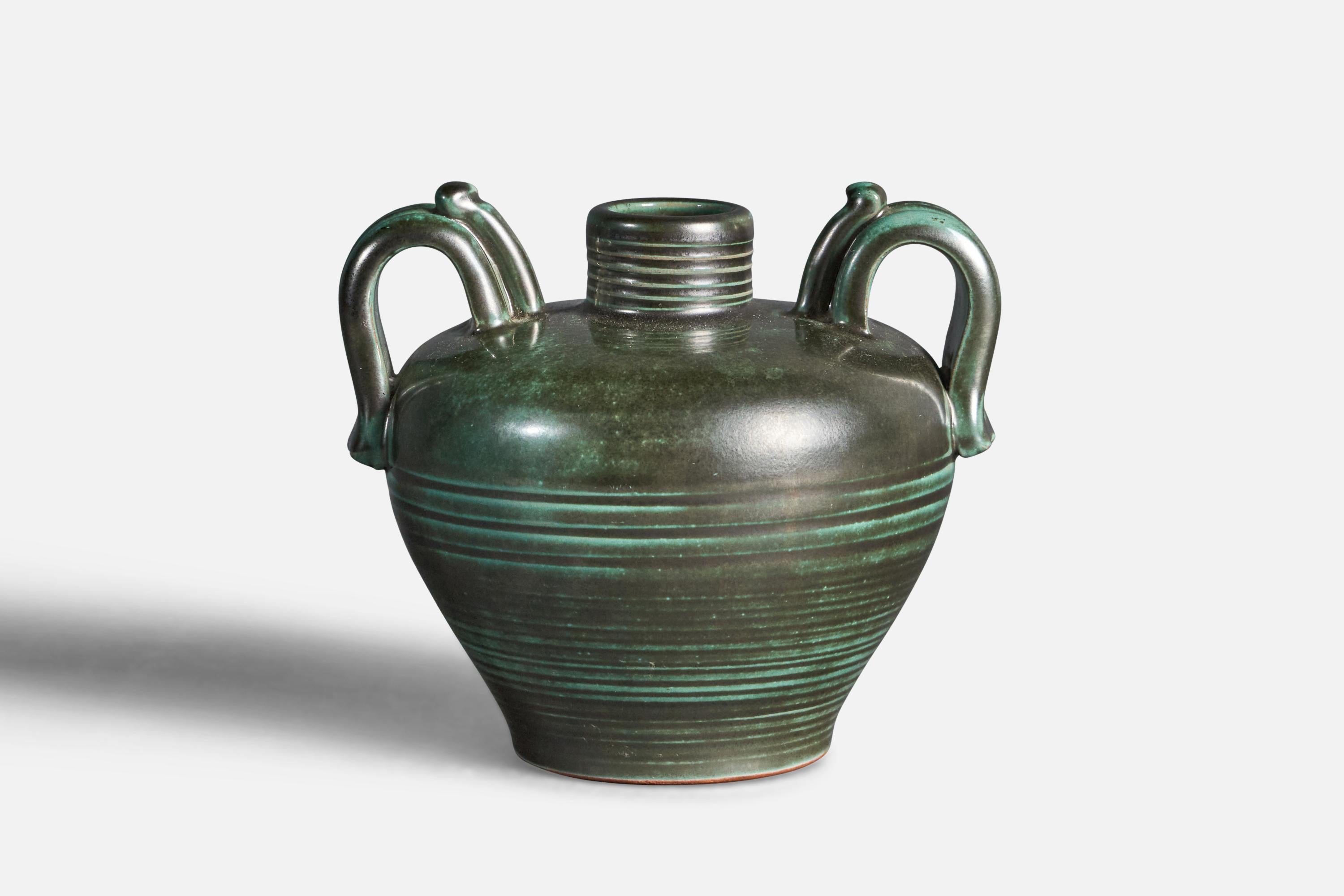 A green-glazed and incised earthenware vase, designed and produced by Upsala Ekeby, Sweden, 1930s.