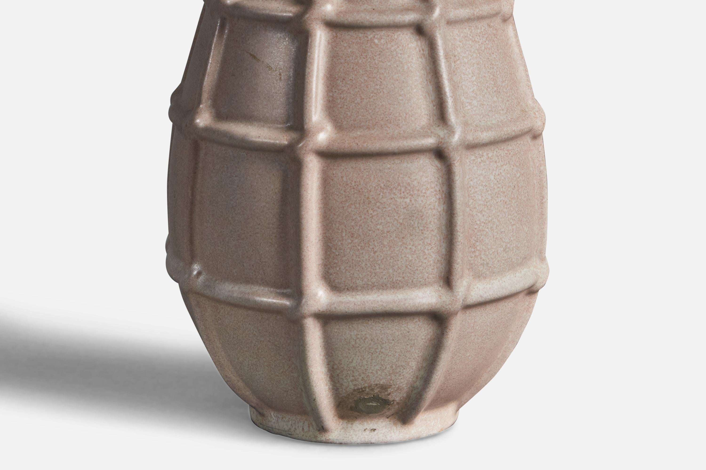 A beige-glazed earthenware vase designed and produced by Upsala Ekeby, Sweden, 1930s.


