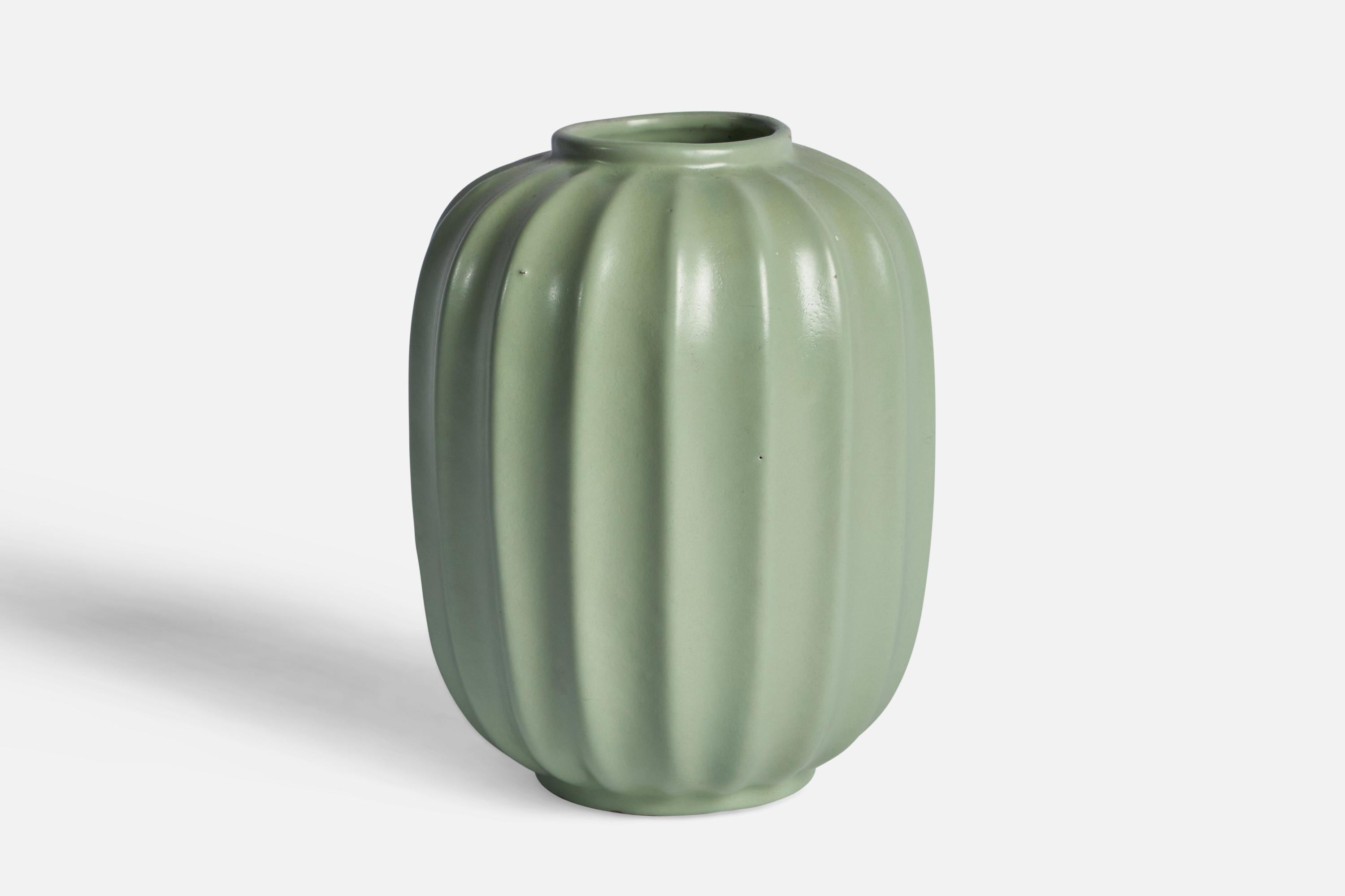 A green-glazed fluted vase designed and produced by Upsala-Ekeby, Sweden, 1930s.