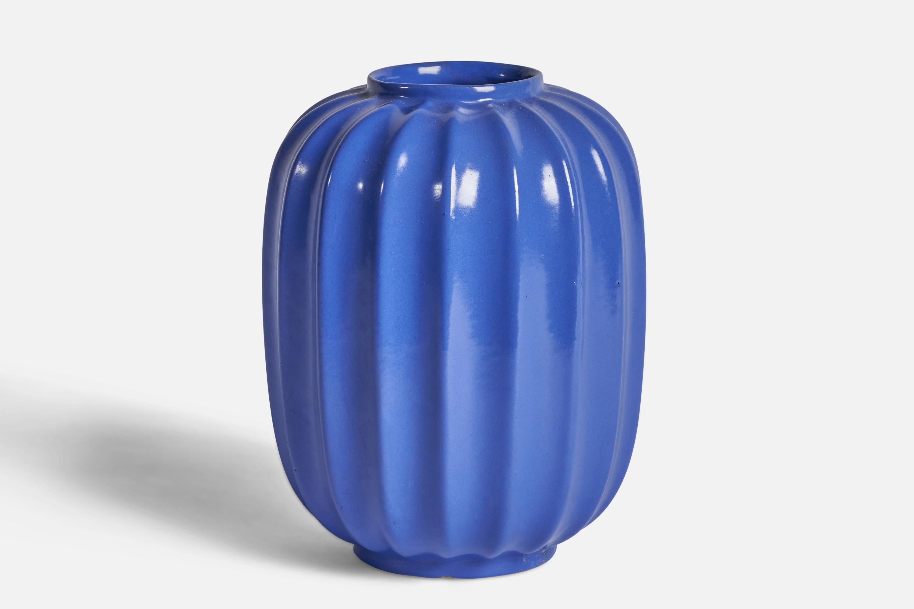 A blue-glazed fluted vase designed and produced by Upsala Ekeby, Sweden, 1930s.