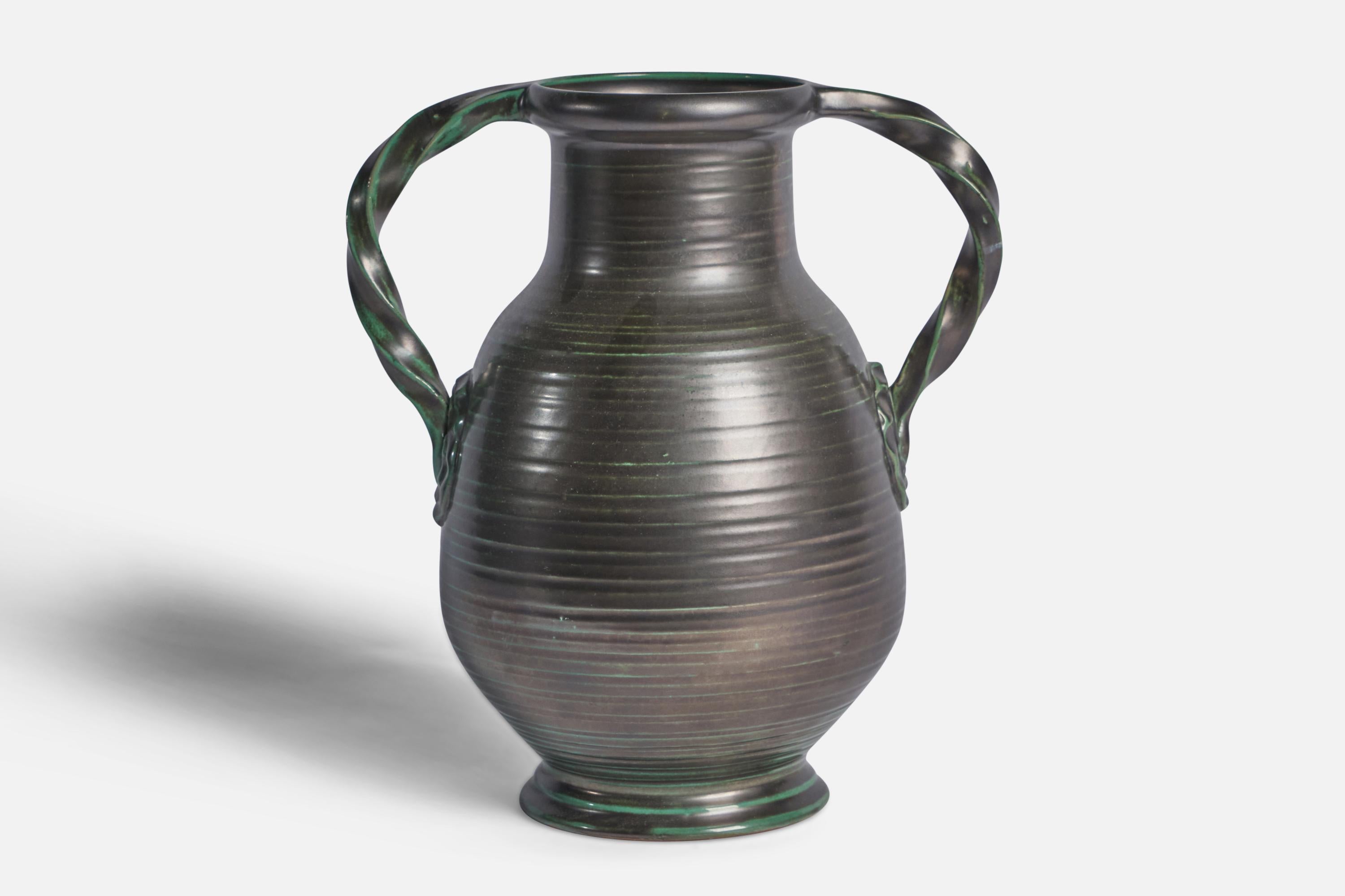 A green-glazed and incised earthenware vase designed and produced by Upsala Ekeby, Sweden, 1930s.