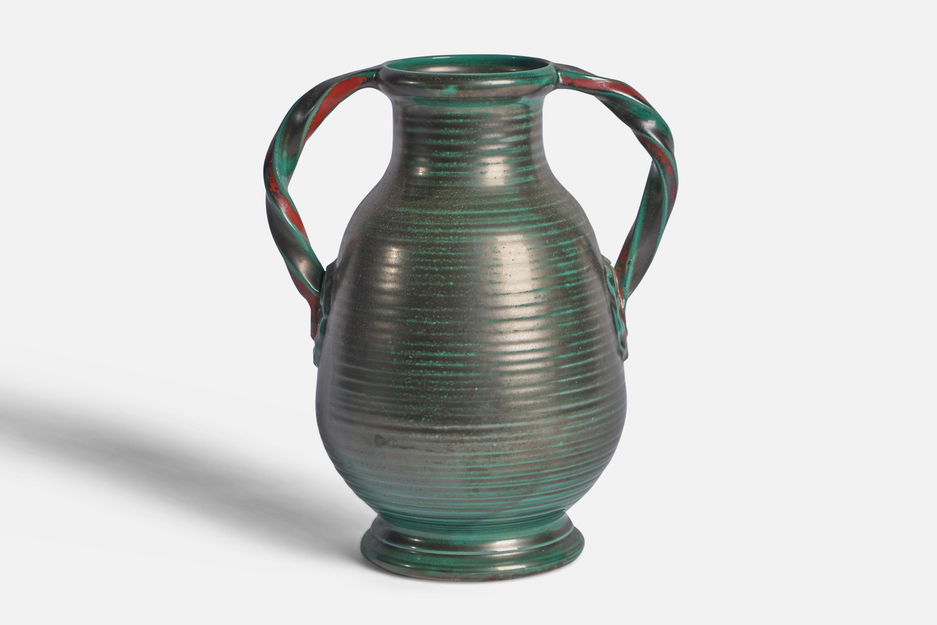 A green orange-glazed and incised earthenware vase designed and produced by Upsala Ekeby, Sweden, 1930s.