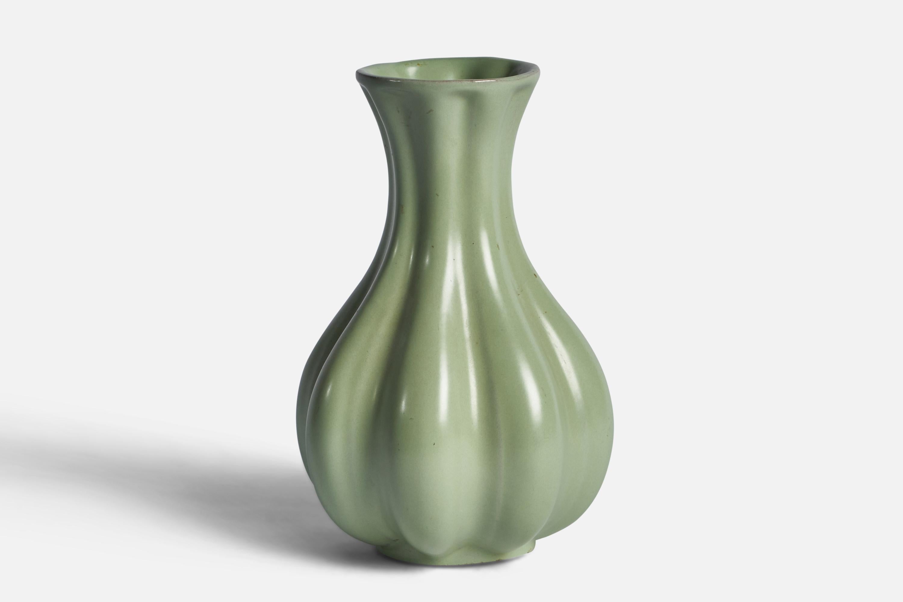 A fluted celadon-green-glazed earthenware vase designed and produced by Upsala Ekeby, Sweden, 1930s.