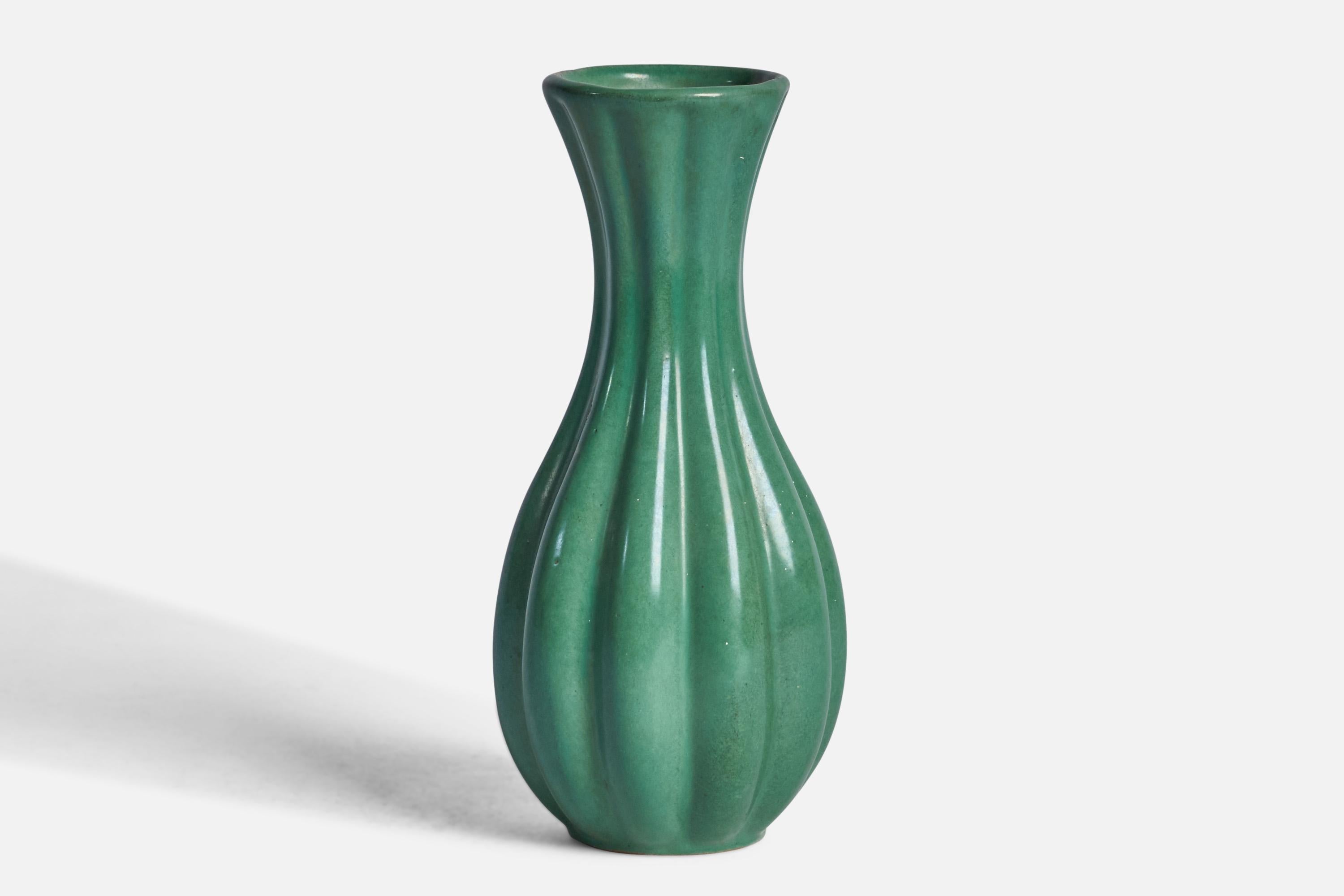 A fluted green-glazed earthenware vase designed and produced by Upsala Ekeby, Sweden, 1930s.
 