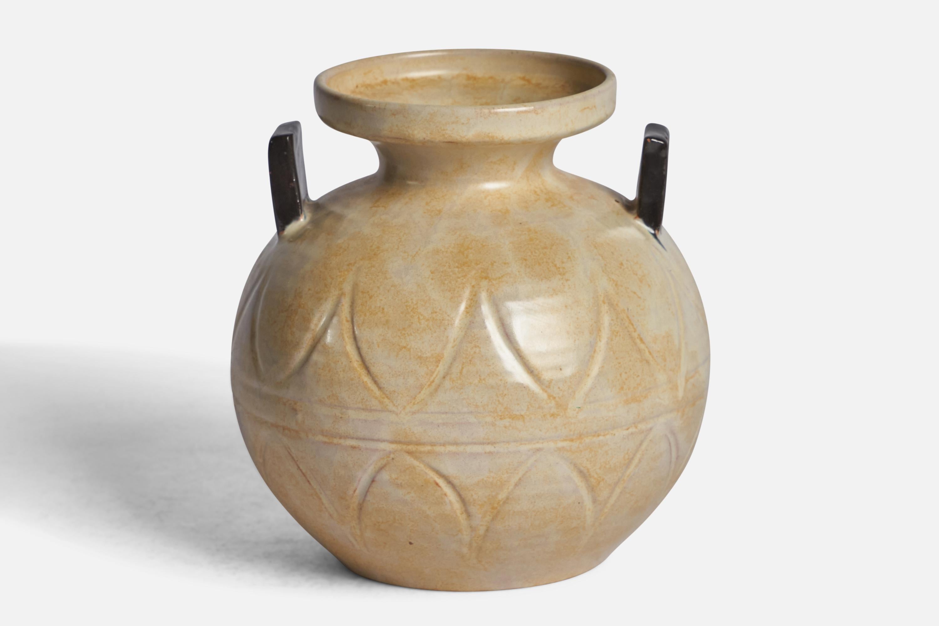 A beige and black-glazed incised earthenware vase designed and produced by Upsala Ekeby, Sweden, 1930s.