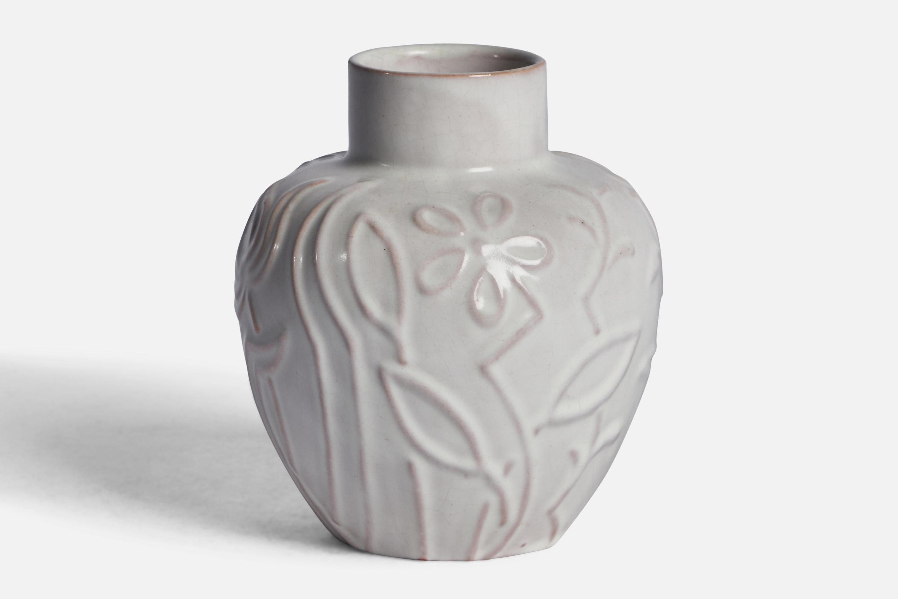 A white-glazed earthenware vase designed and produced by Upsala Ekeby, Sweden, 1930s.