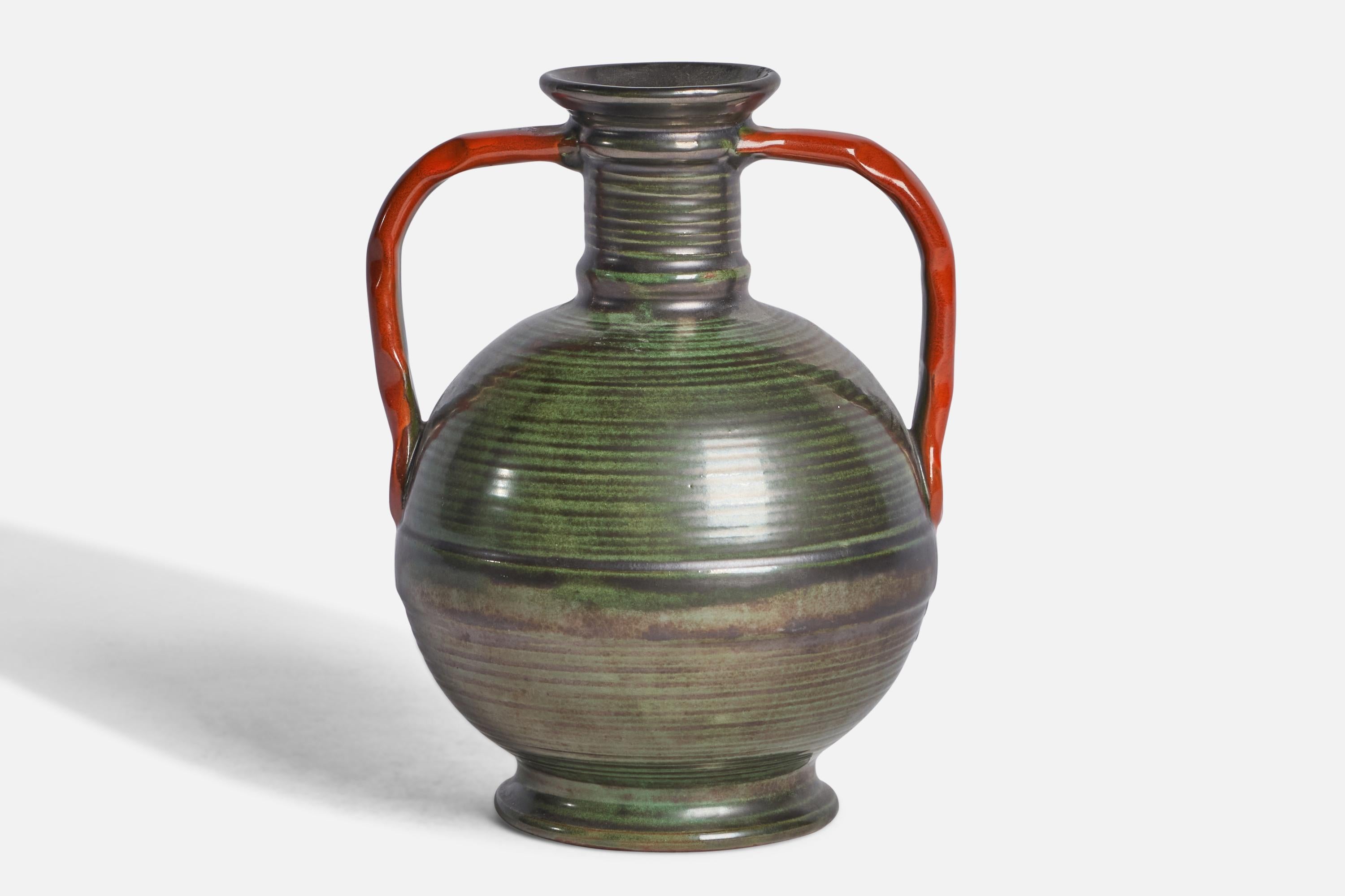 A green and orange-glazed incised earthenware vase designed and produced by Upsala Ekeby, Sweden, 1930s.