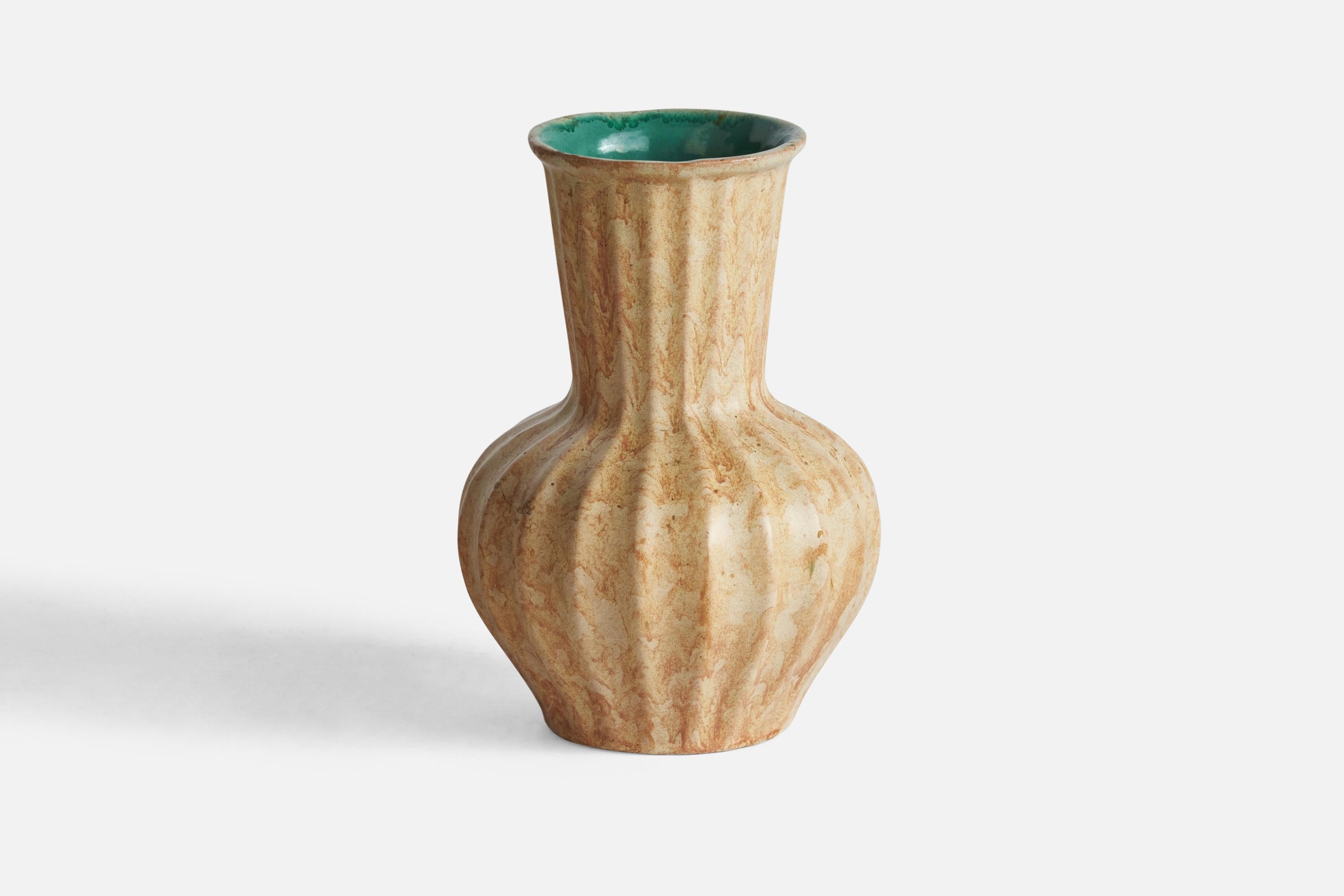 A fluted beige and green-glazed earthenware vase designed and produced by Upsala Ekeby, Sweden, 1930s.