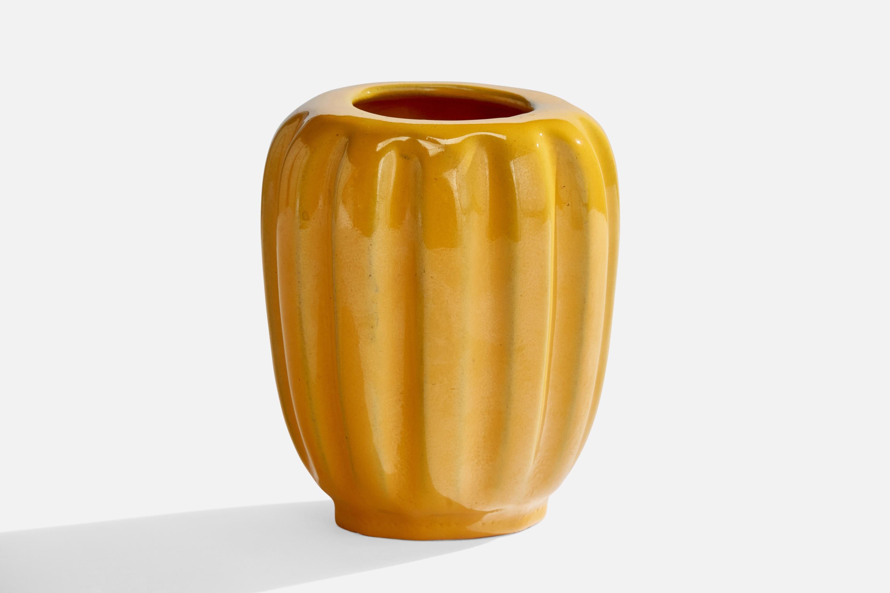 A yellow-glazed earthenware vase designed and produced by Upsala Ekeby, Sweden, 1930s.
