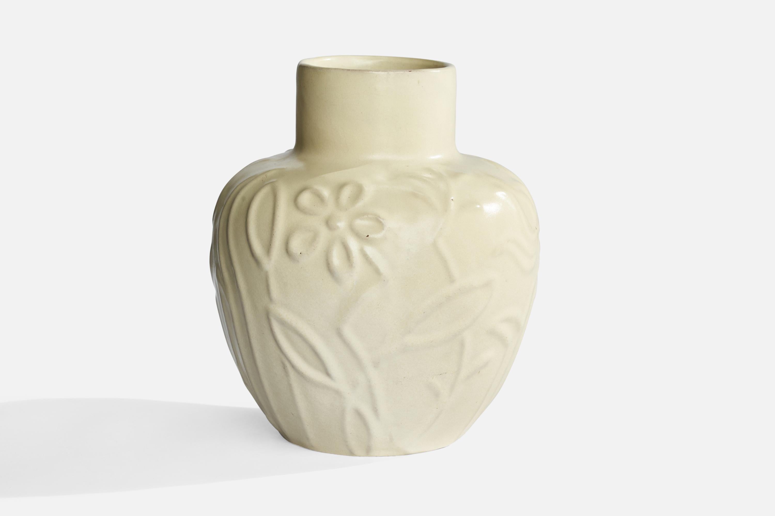 A beige-glazed earthenware vase designed and produced by Upsala Ekeby, Sweden, 1930s.