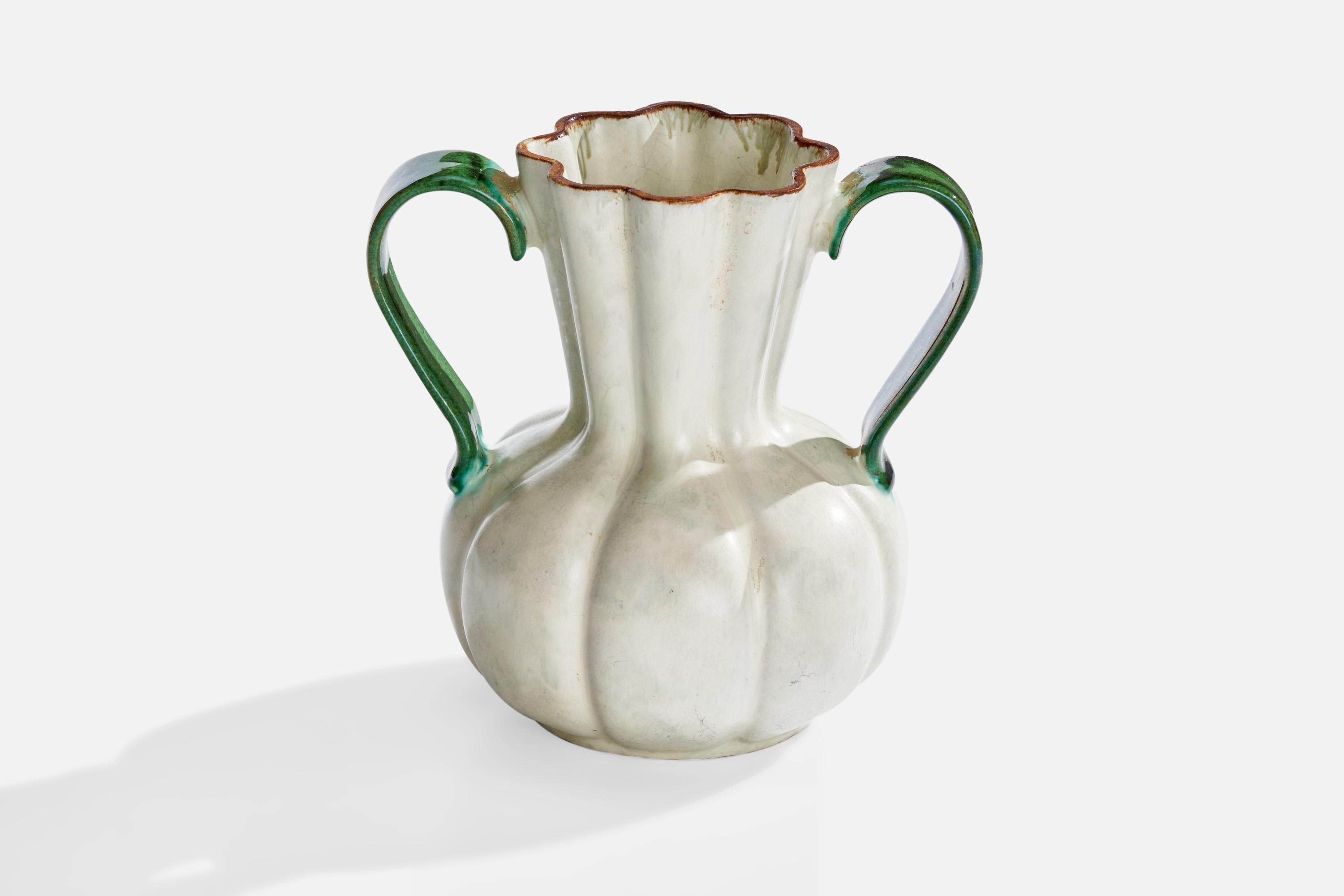 A white and green-glazed earthenware vase designed and produced by Upsala Ekeby, Sweden, 1930s.