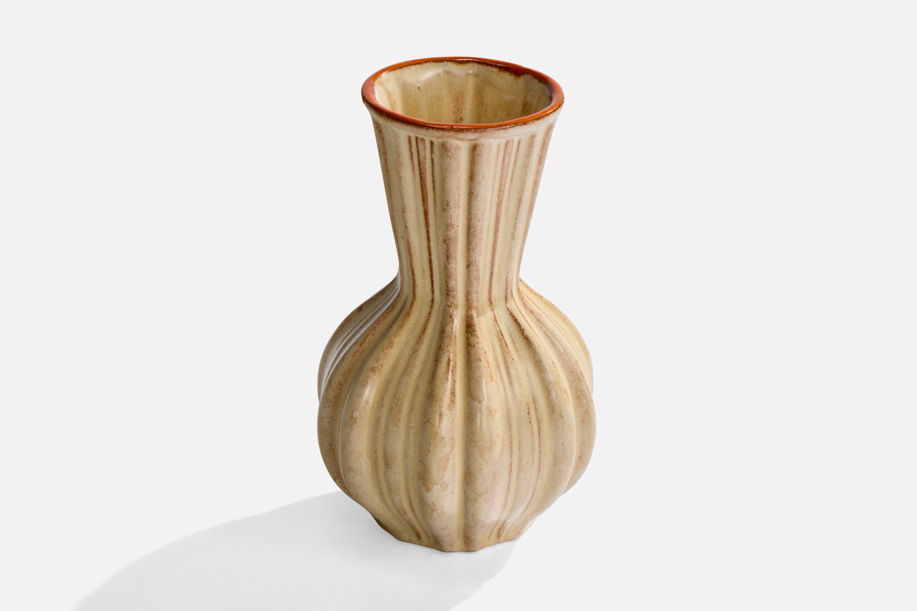 A beige and brown-glazed earthenware vase attributed to Upsala Ekeby, Sweden, c. 1930s.

Overall Dimensions (inches): 6.0