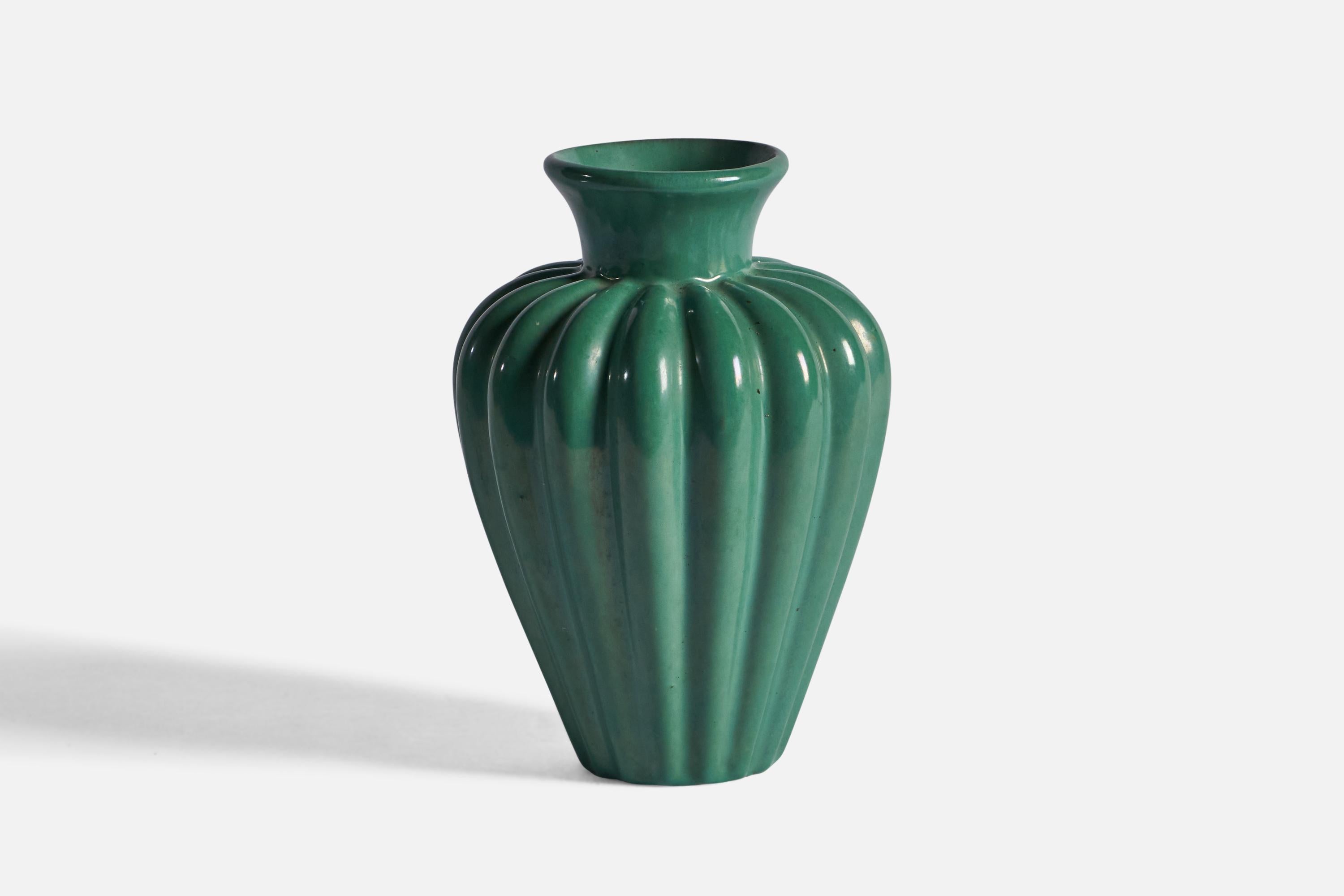 A green-glazed fluted vase designed and produced by Upsala Ekeby, Sweden, c. 1940s.