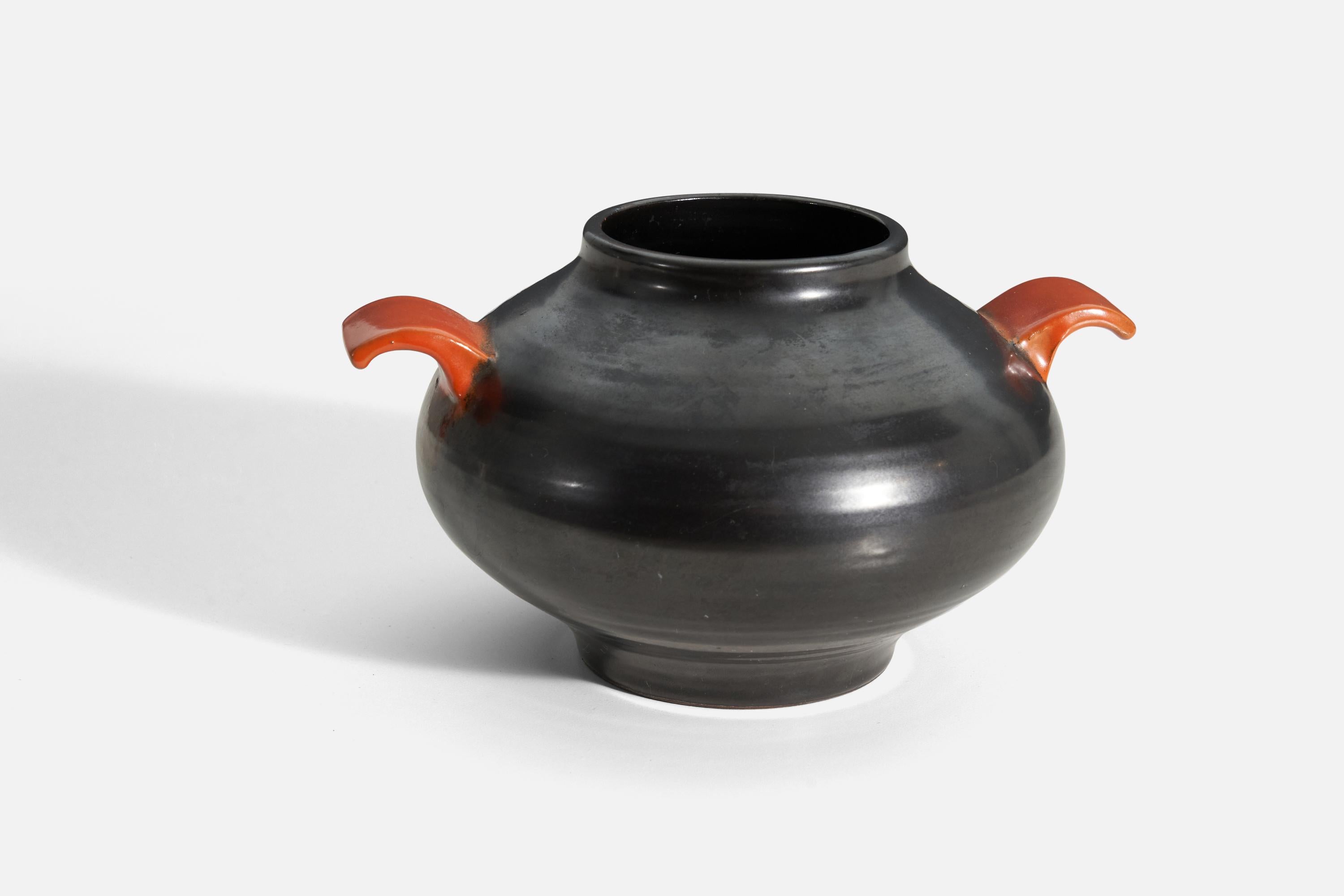 A black and orange-glazed earthenware vase produced by Upsala-Ekeby, Sweden, 1940s. 

