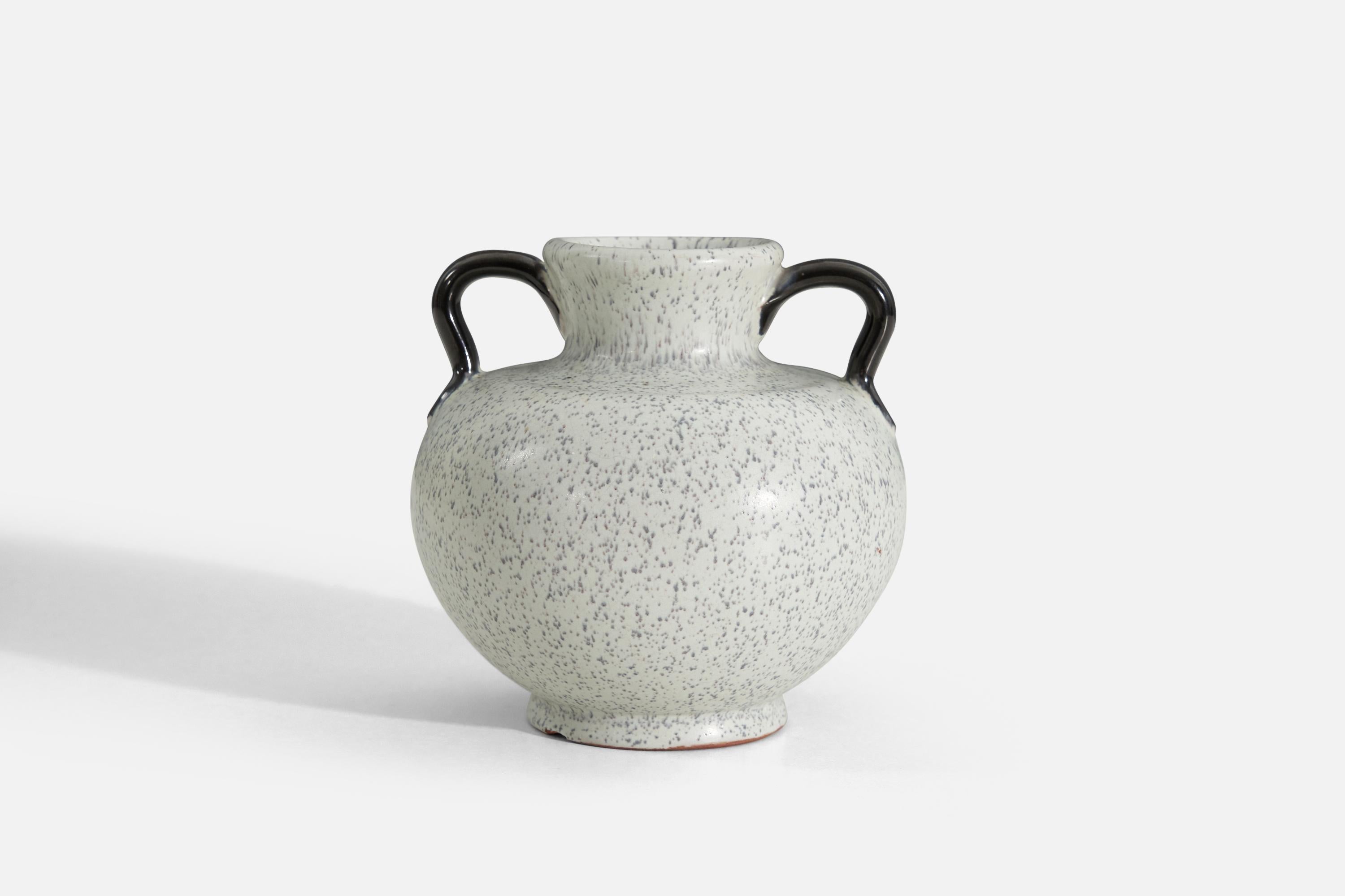 An off-white and speckle glazed earthenware vase produced by Upsala-Ekeby, Sweden, 1940s.

