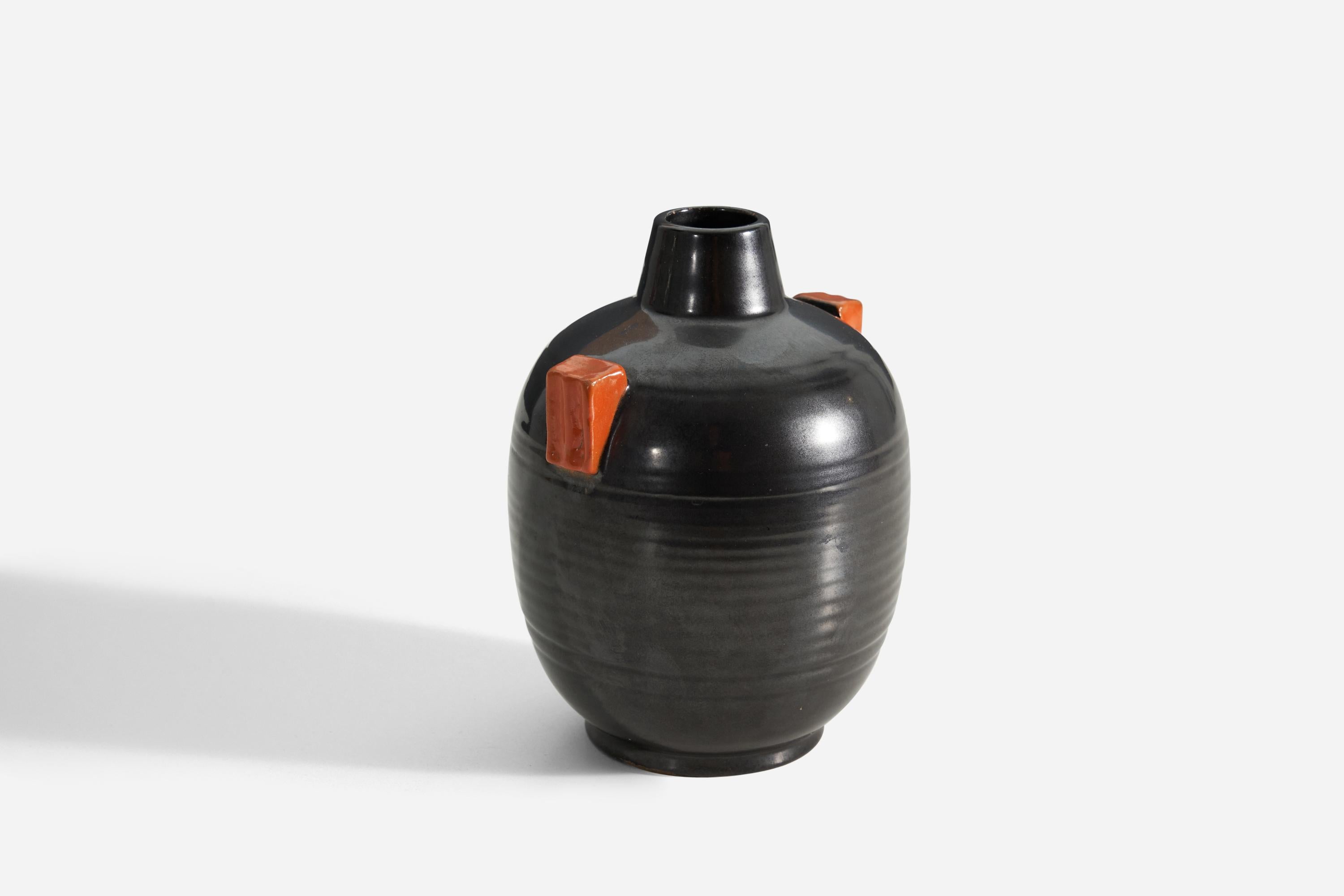 A black and orange earthenware vase produced by Upsala-Ekeby, Sweden, 1940s. 

