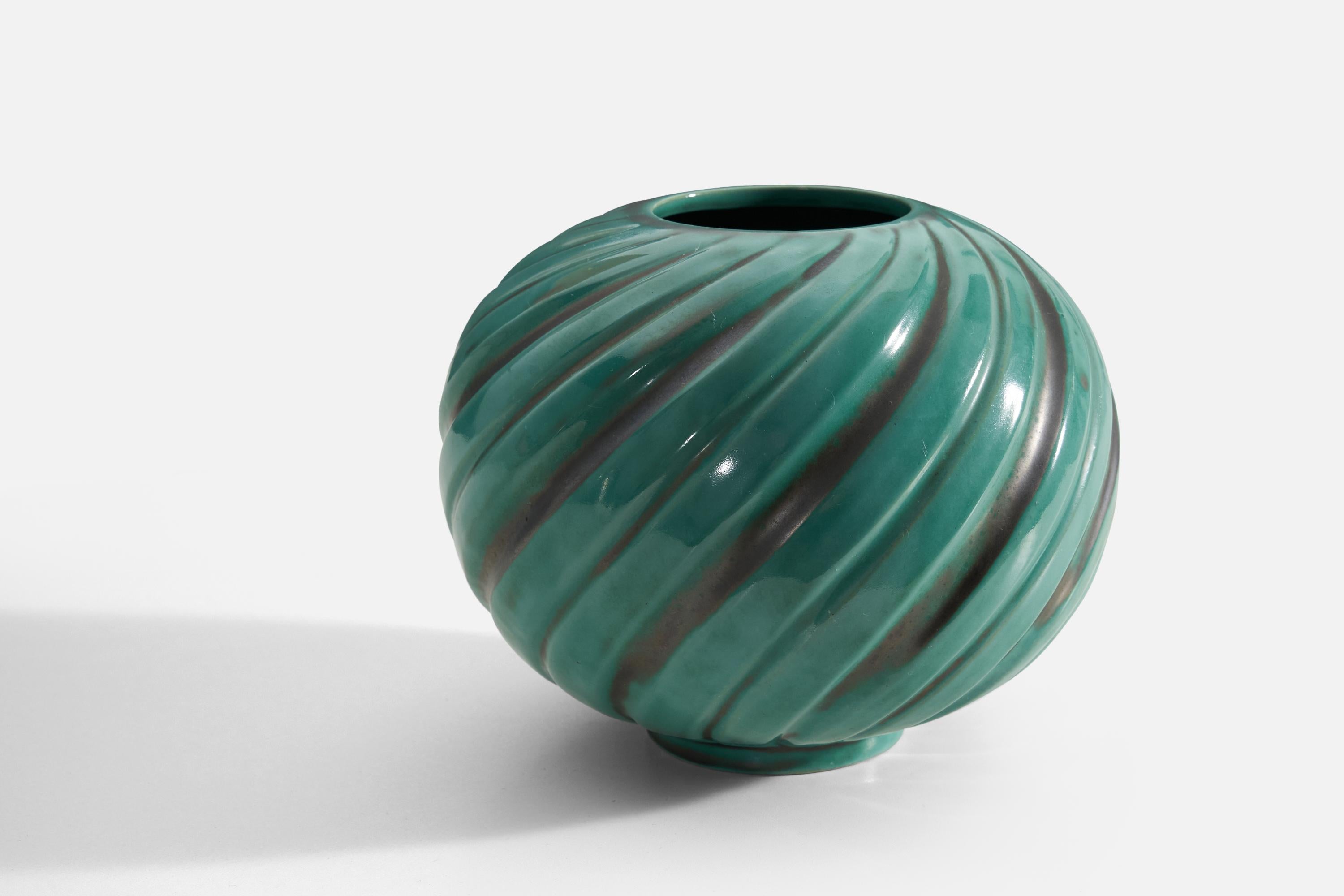 A green-glazed earthenware vase designed by Anna-Lisa Thomson and produced by Upsala-Ekeby, Sweden, 1940s. 

