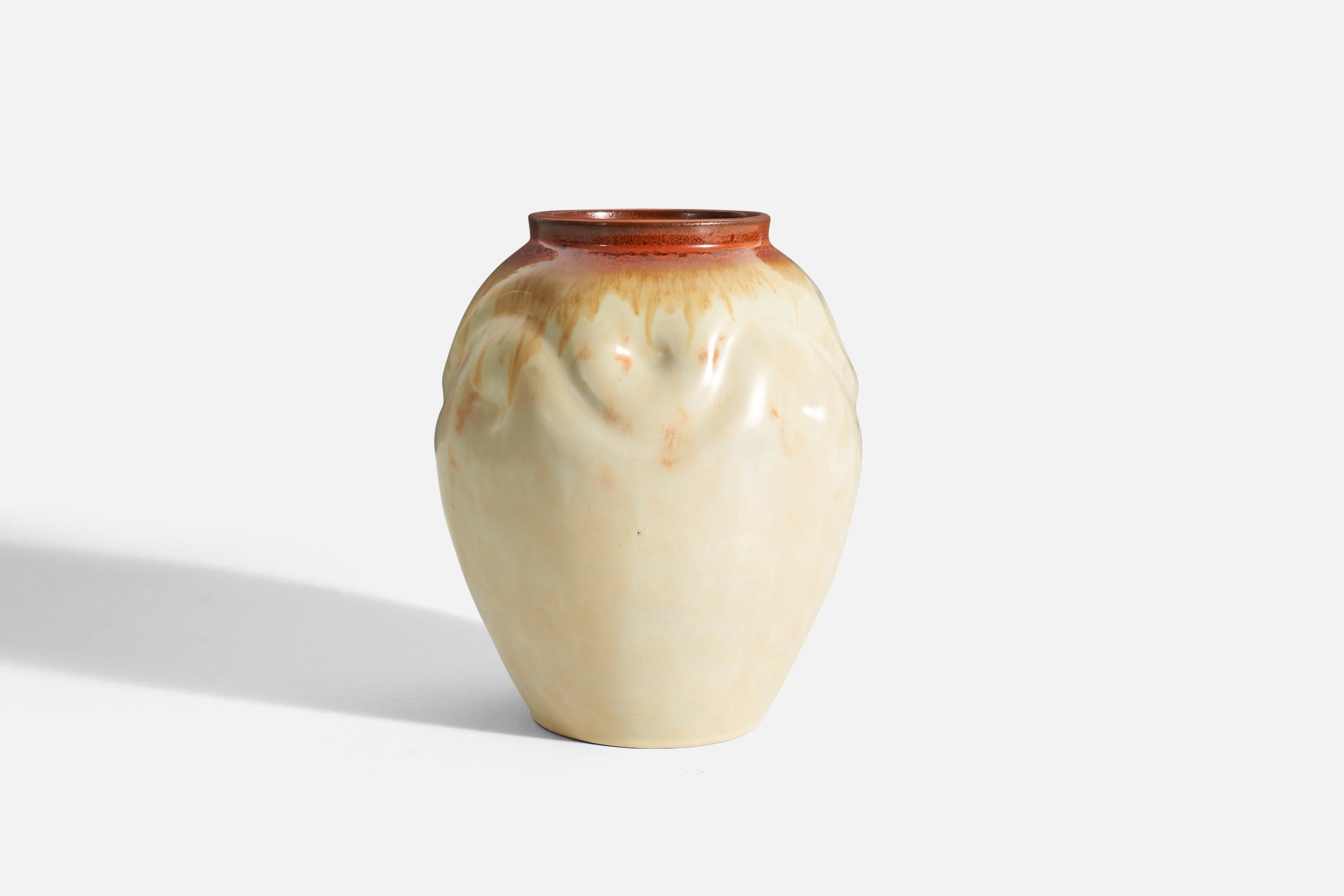 A yellow, cream, and orange glazed earthenware vase produced by Upsala-Ekeby, Sweden, 1940s.

 