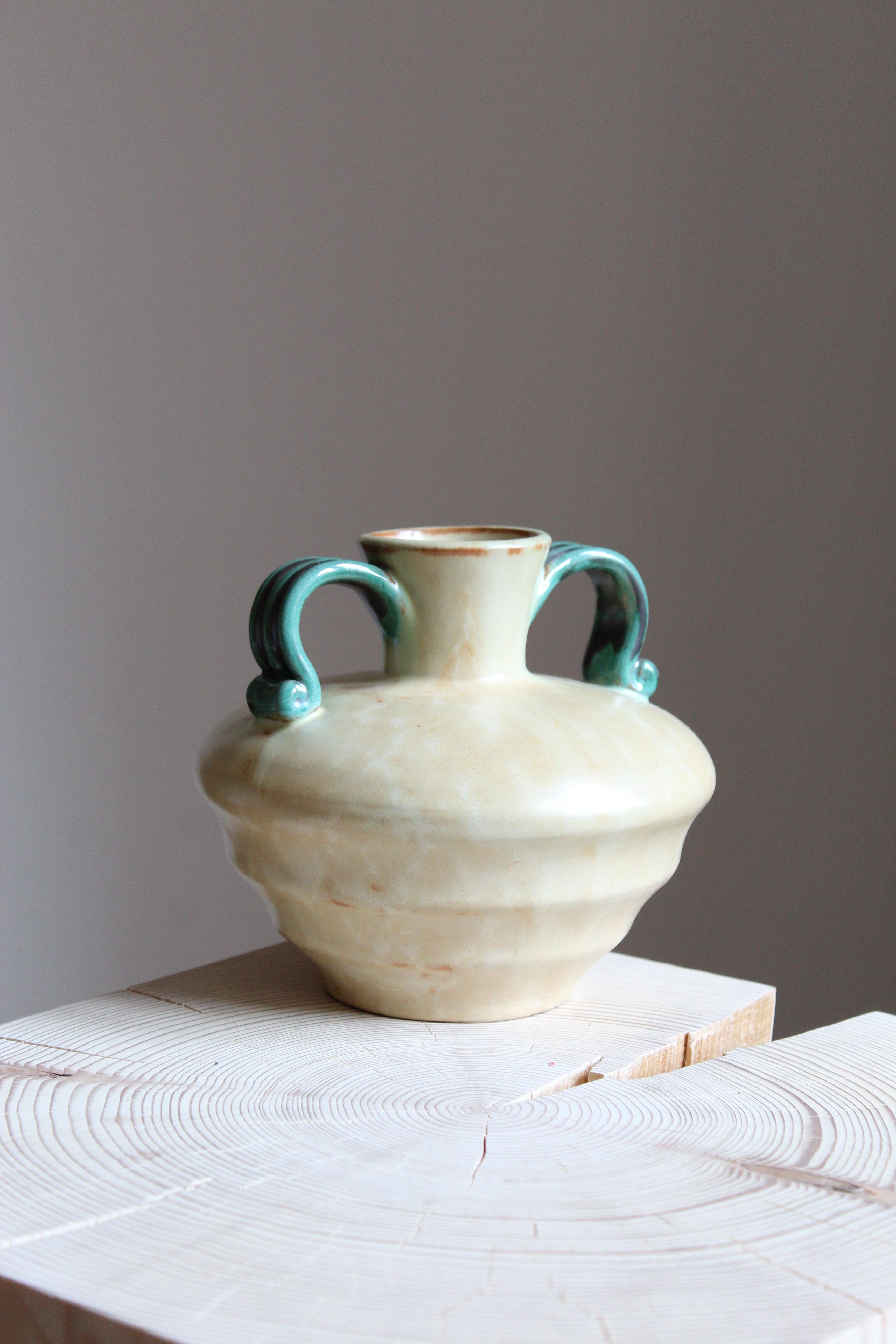 A small early modernist vase. Produced by Upsala-Ekeby, Sweden, 1940s.


Other designers of the period include Ettore Sottsass, Carl Harry Stålhane, Lisa Larsson, Axel Salto, and Arne Bang.