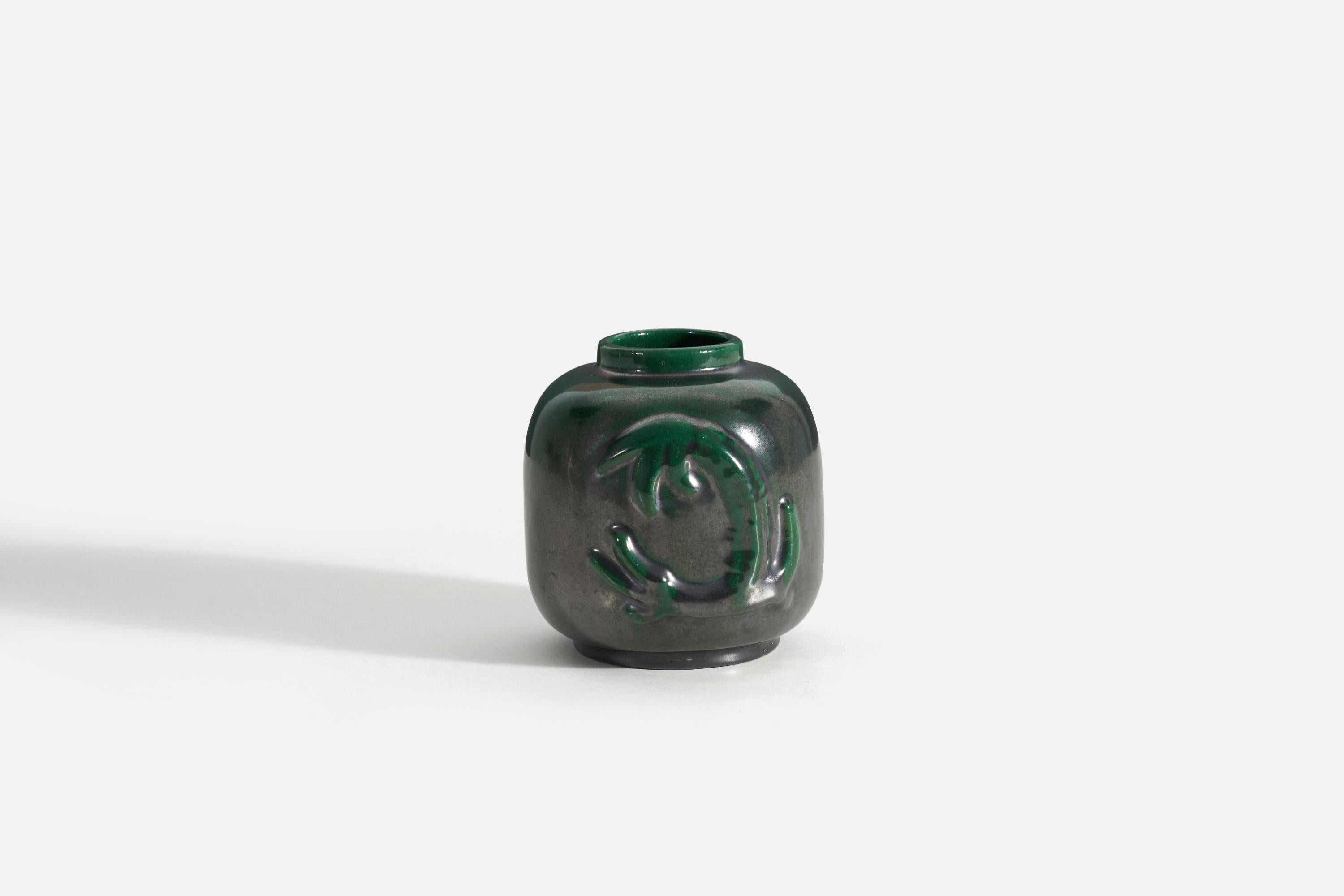 A green glazed earthenware vase produced by Upsala-Ekeby, Sweden, 1940s. 

.