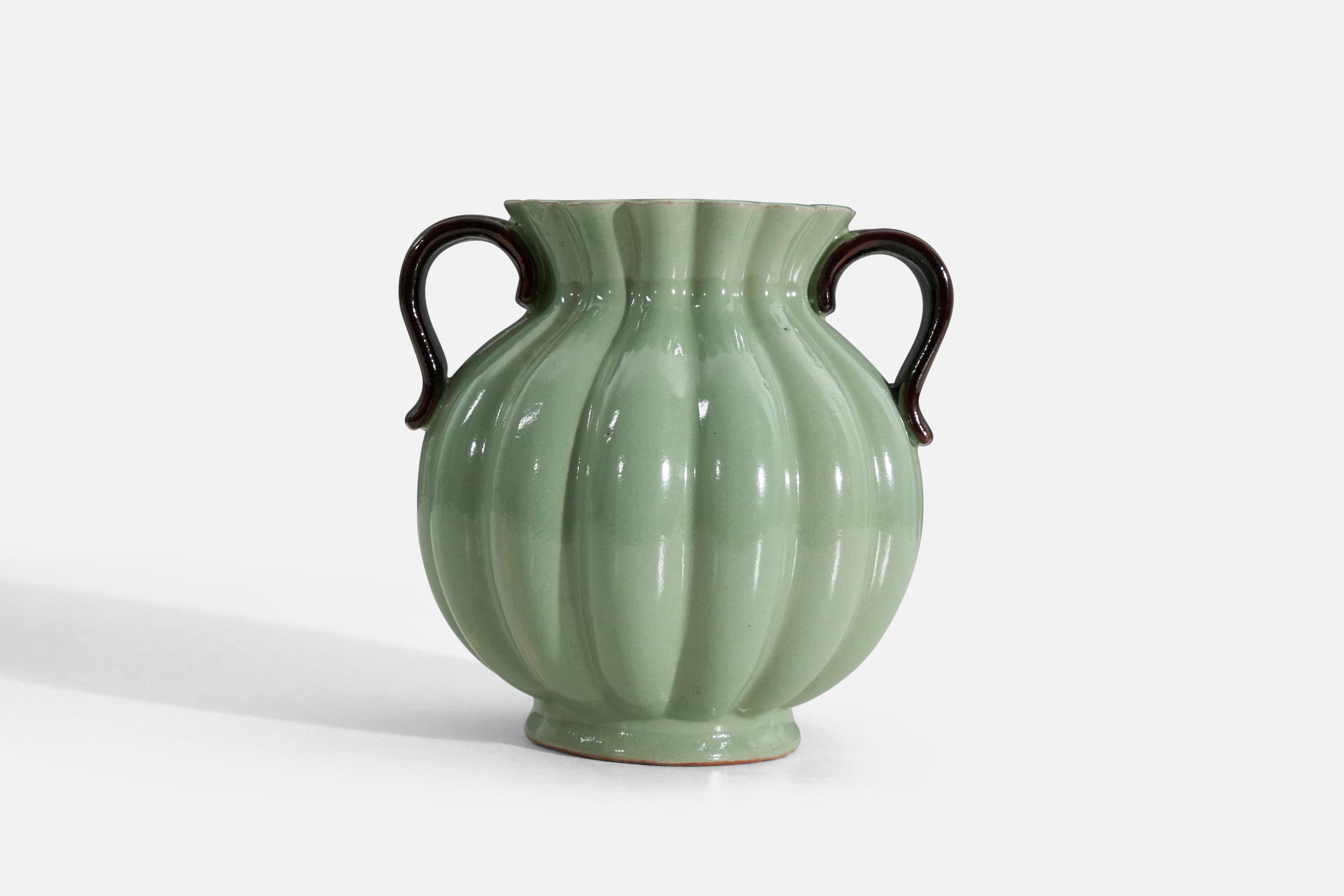 A green and black-glazed vase produced by Upsala-Ekeby, Sweden, 1940s.

