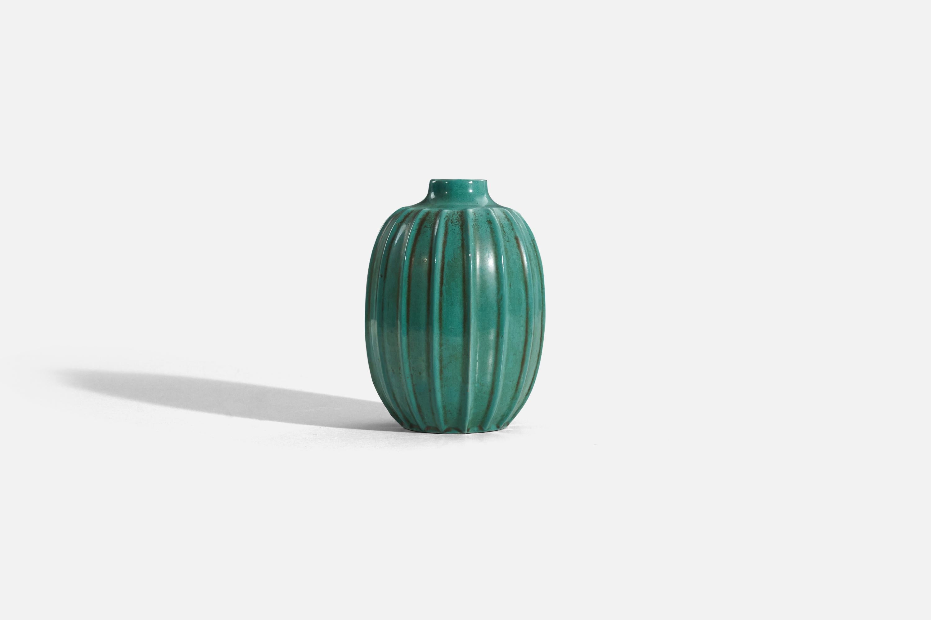 A green, glazed earthenware vase designed and produced by Upsala-Ekeby, Sweden, 1940s. 

