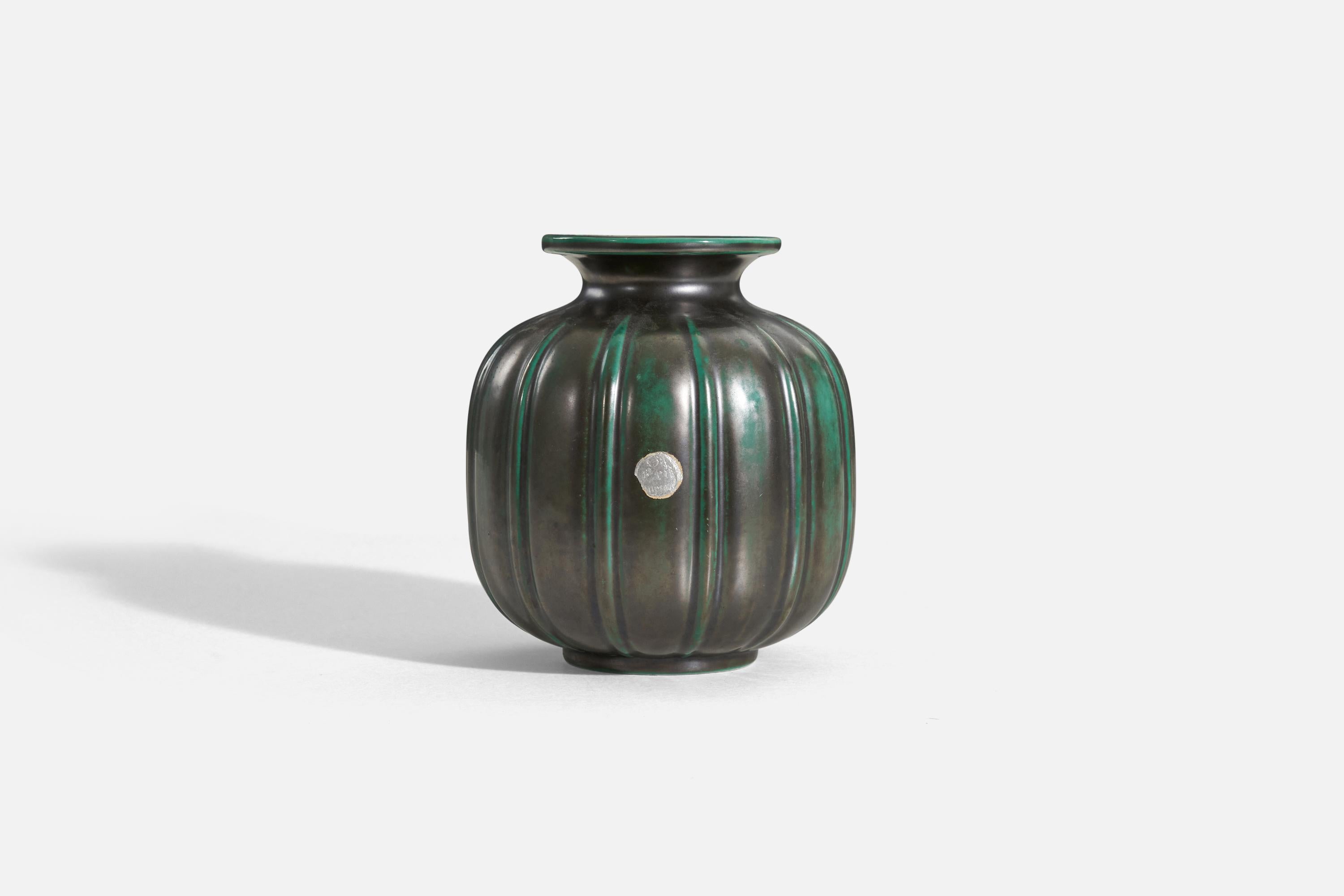 A green-glazed earthenware vase designed and produced by Upsala-Ekeby, Sweden, 1940s.

