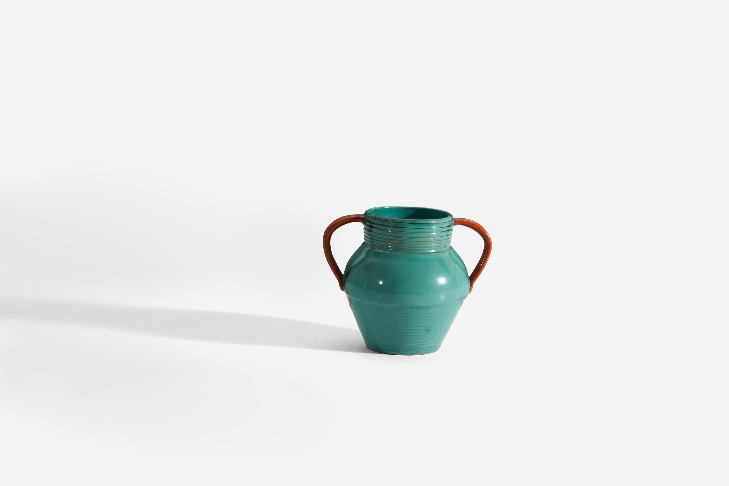 A green and orange glazed earthenware vase produced by Upsala-Ekeby, Sweden, 1940s. 

.